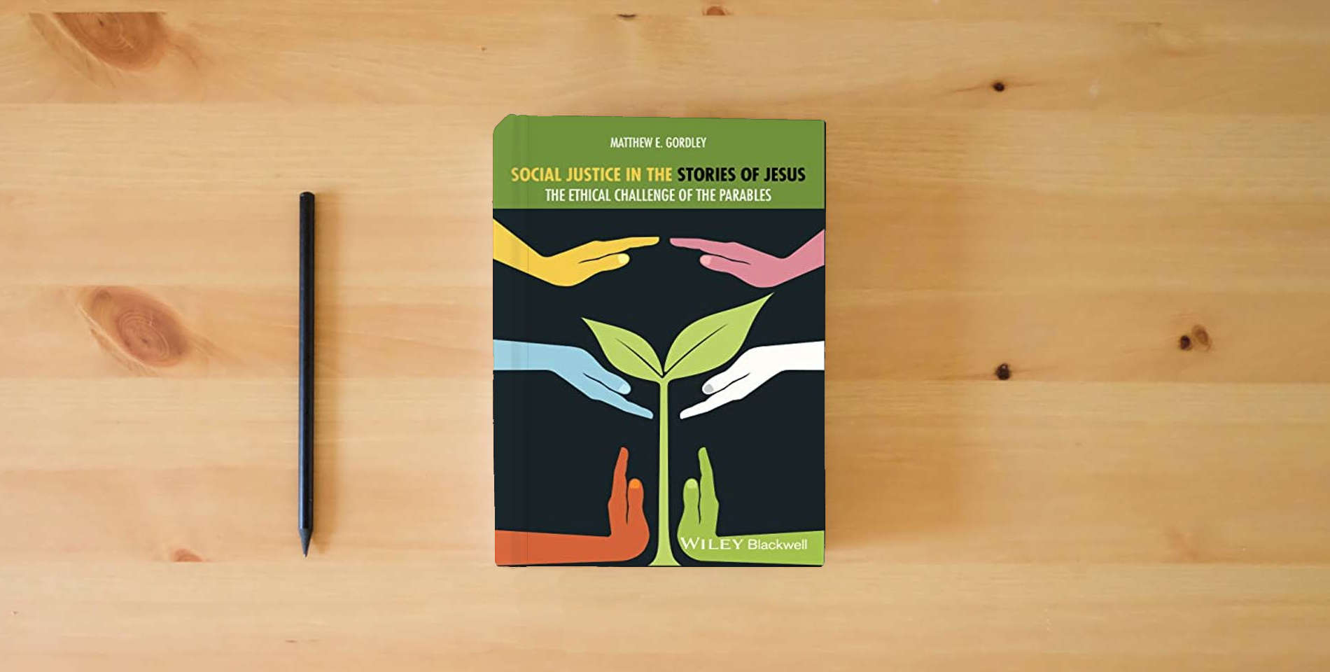 The book Parables and Social Justice: Jesus's Challenging Invitation to Embrace our Humanity and Cultivate an Ethic of Love, Mercy, and Justice (Lived Religions) is on the table
