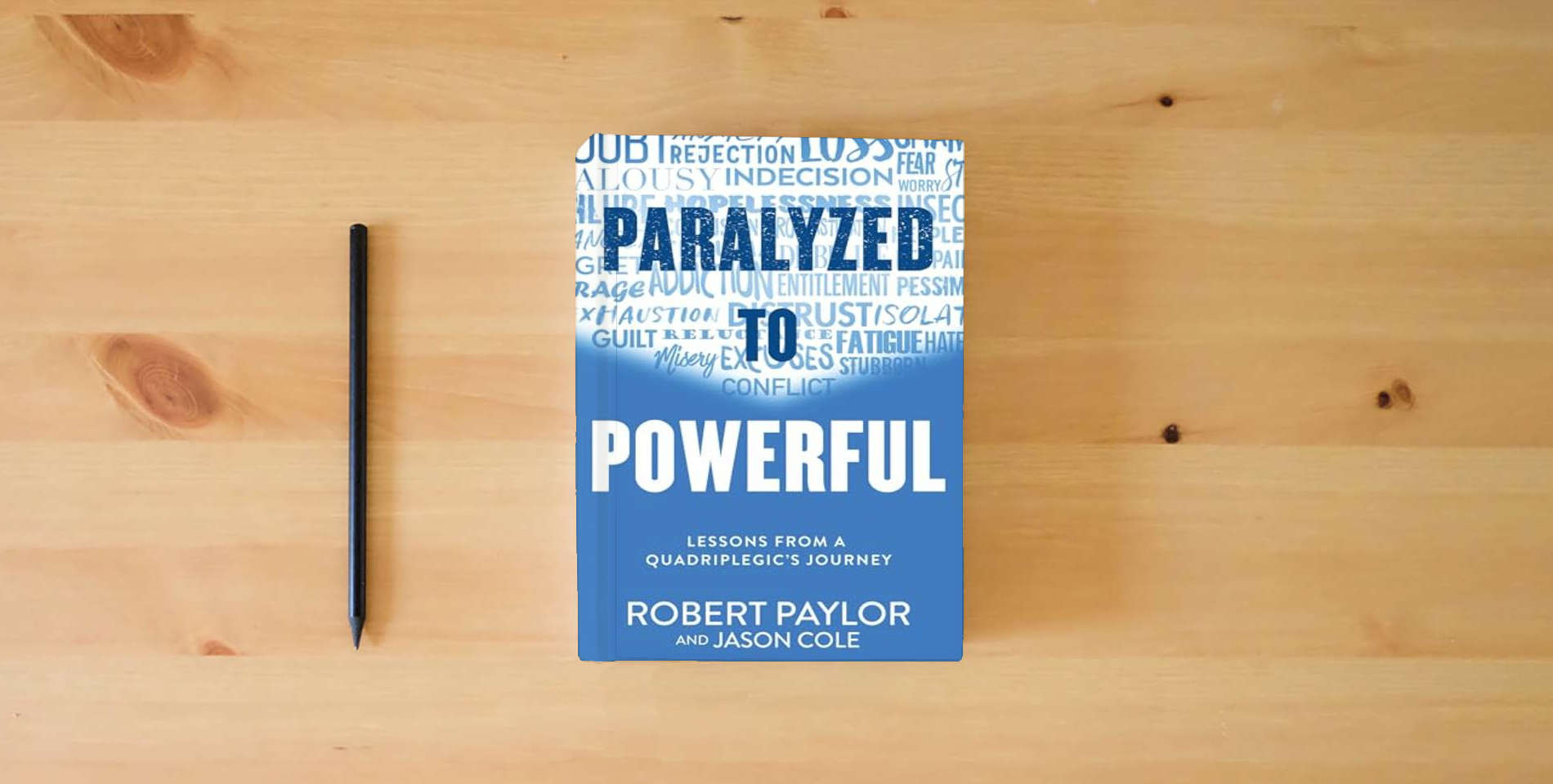 The book Paralyzed to Powerful: Lessons from a Quadriplegic's Journey is on the table