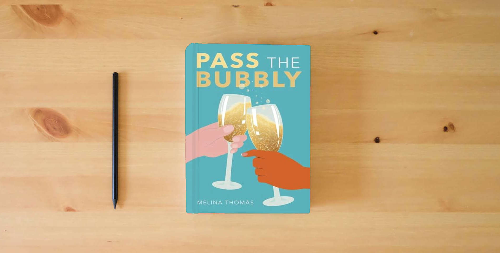 The book Pass the Bubbly is on the table