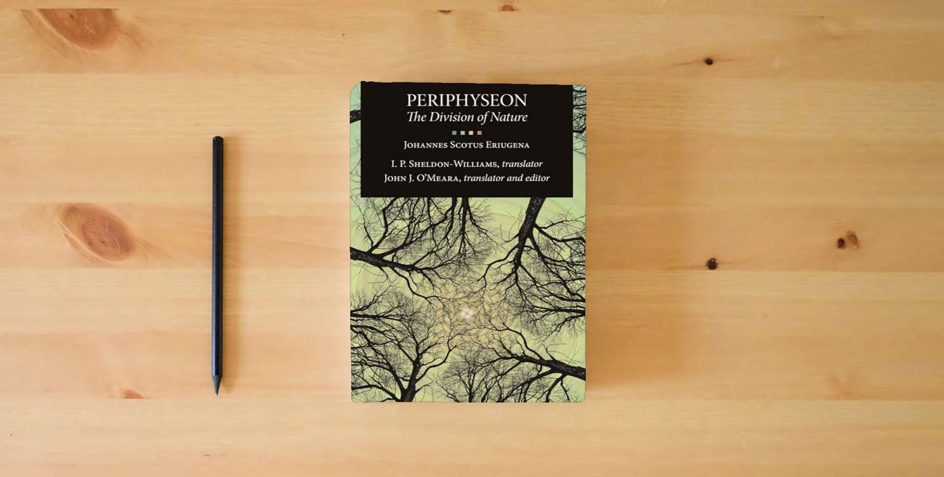 The book Periphyseon: The Division of Nature is on the table