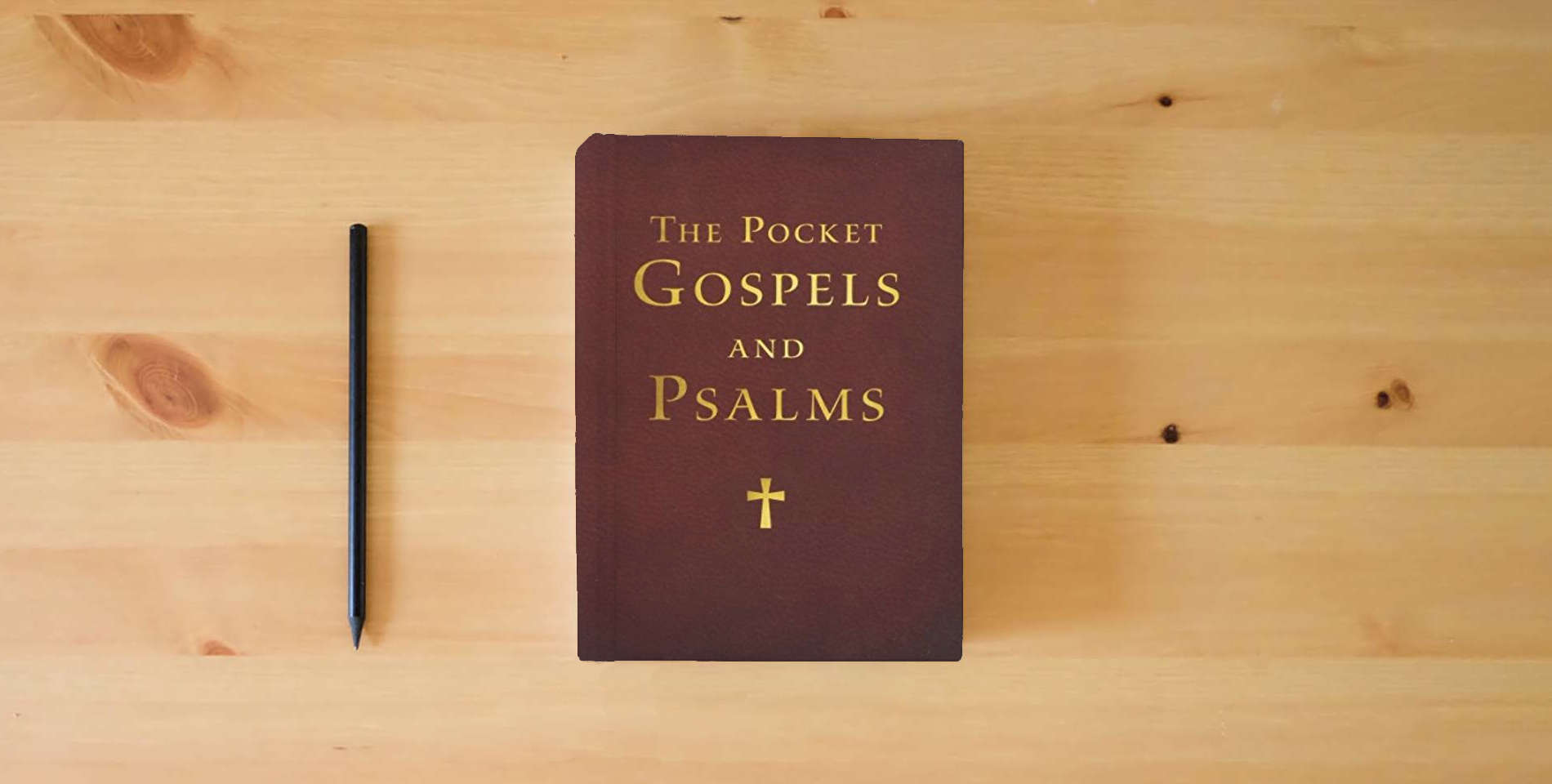 The book Pocket Gospels and Psalms-NRSV is on the table