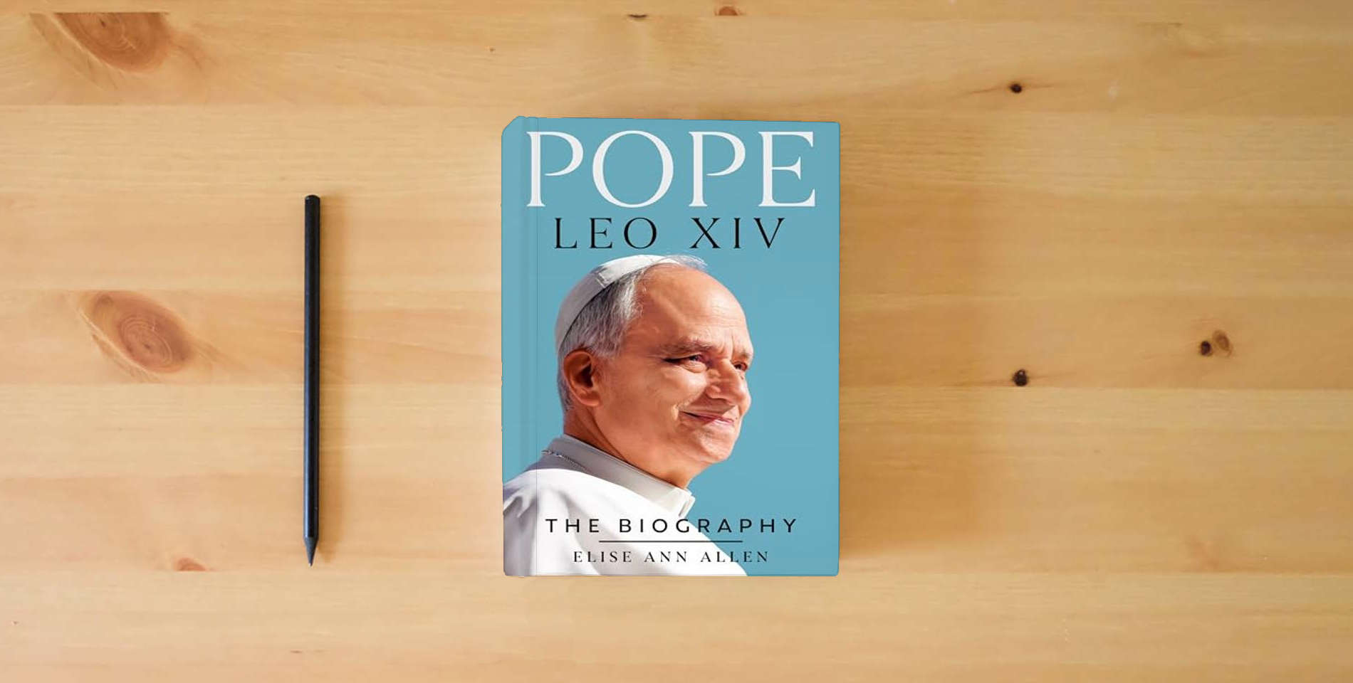 The book Pope Leo XIV: The Biography is on the table