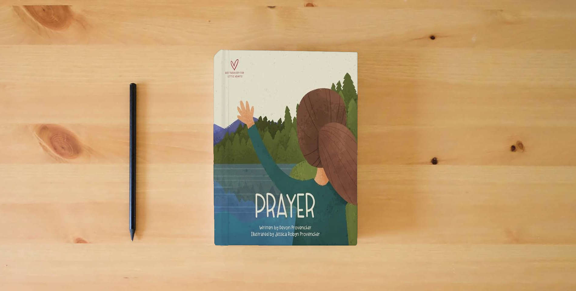 The book Prayer (Big Theology for Little Hearts) is on the table