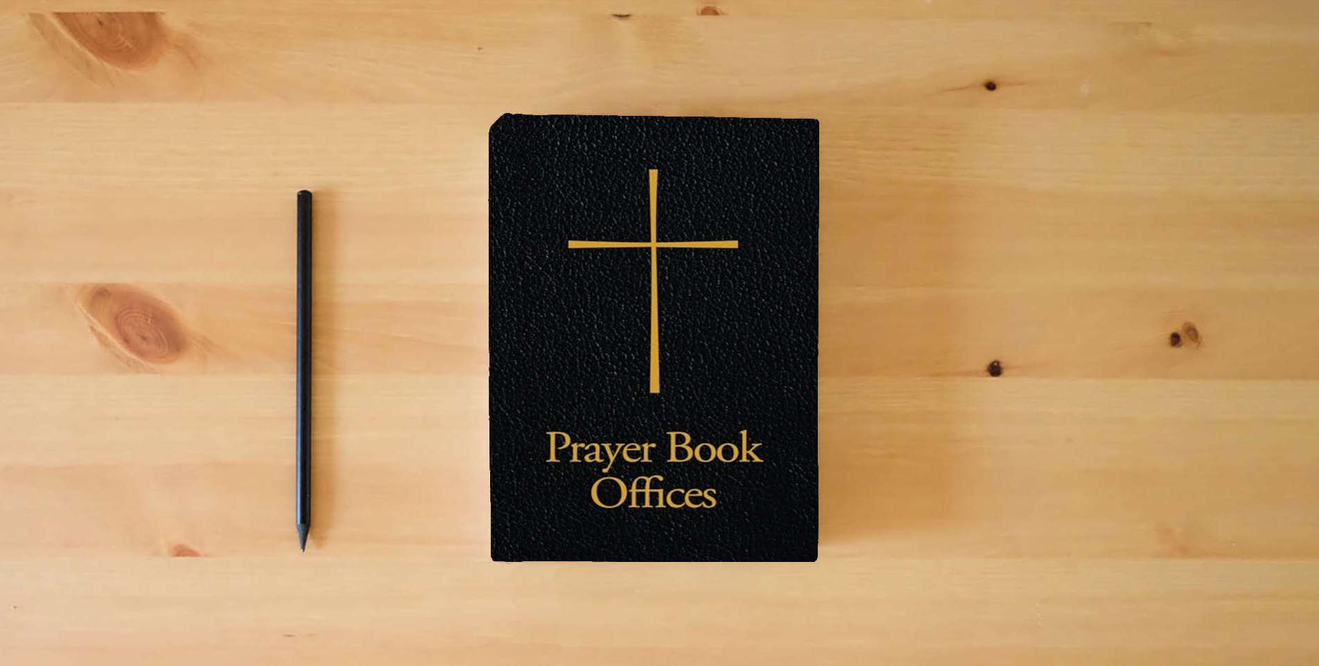 The book Prayer Book Offices is on the table