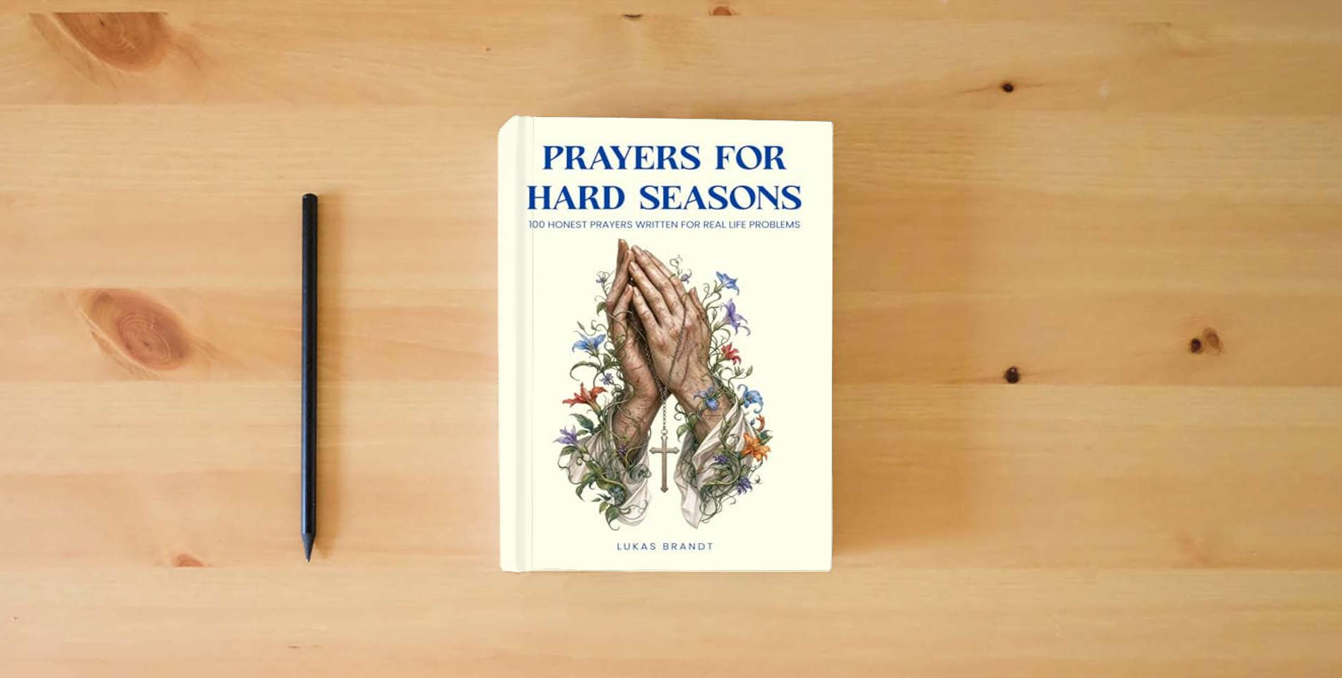 The book Prayers for Hard Seasons: 100 Honest Prayers Written for Real Life Problems is on the table
