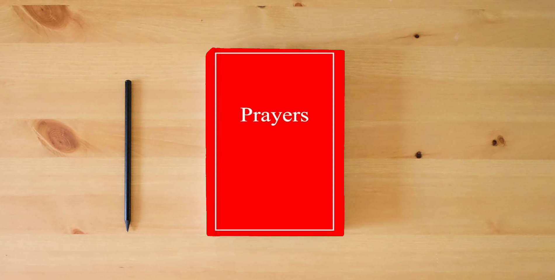 The book Prayers is on the table