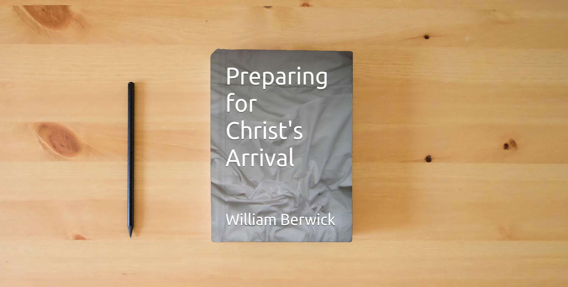 The book Preparing for Christ's Arrival is on the table