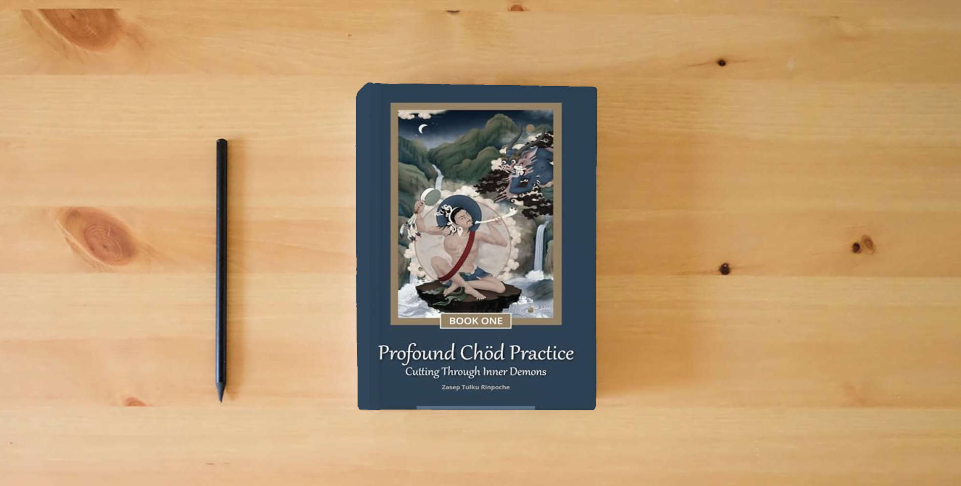 The book Profound Chöd Practice — Cutting Through Inner Demons: Book One is on the table
