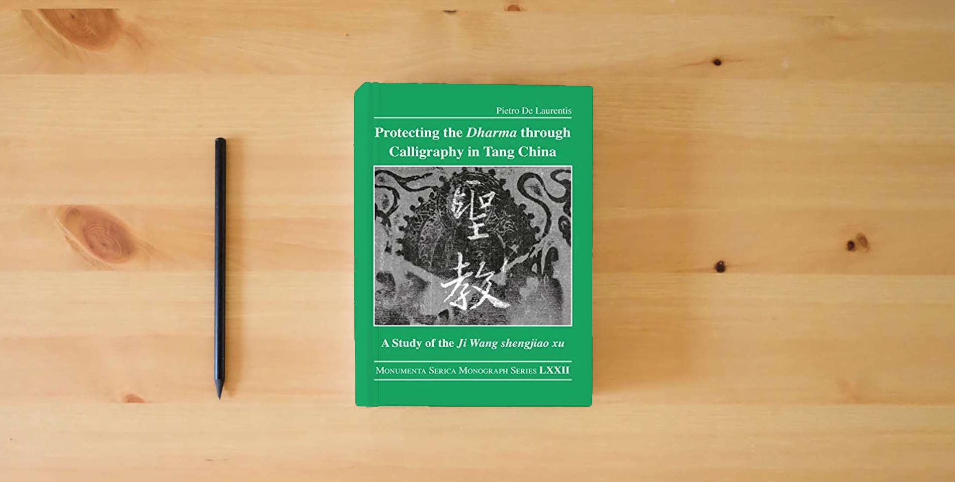 The book Protecting the Dharma through Calligraphy in Tang China: A Study of the Ji Wang shengjiao xu 集王聖教序 The Preface to the Buddhist Scriptures Engraved on ... (Monumenta Serica Monograph Series) is on the table