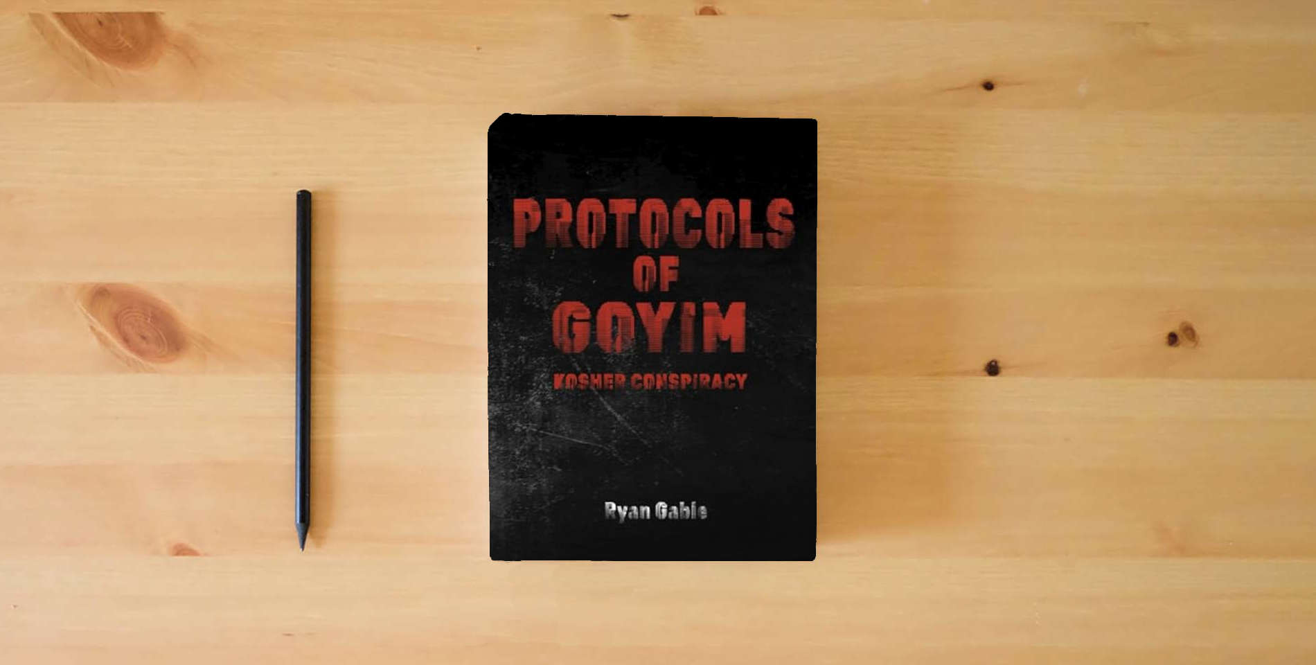 The book Protocols of Goyim: Kosher Conspiracy is on the table