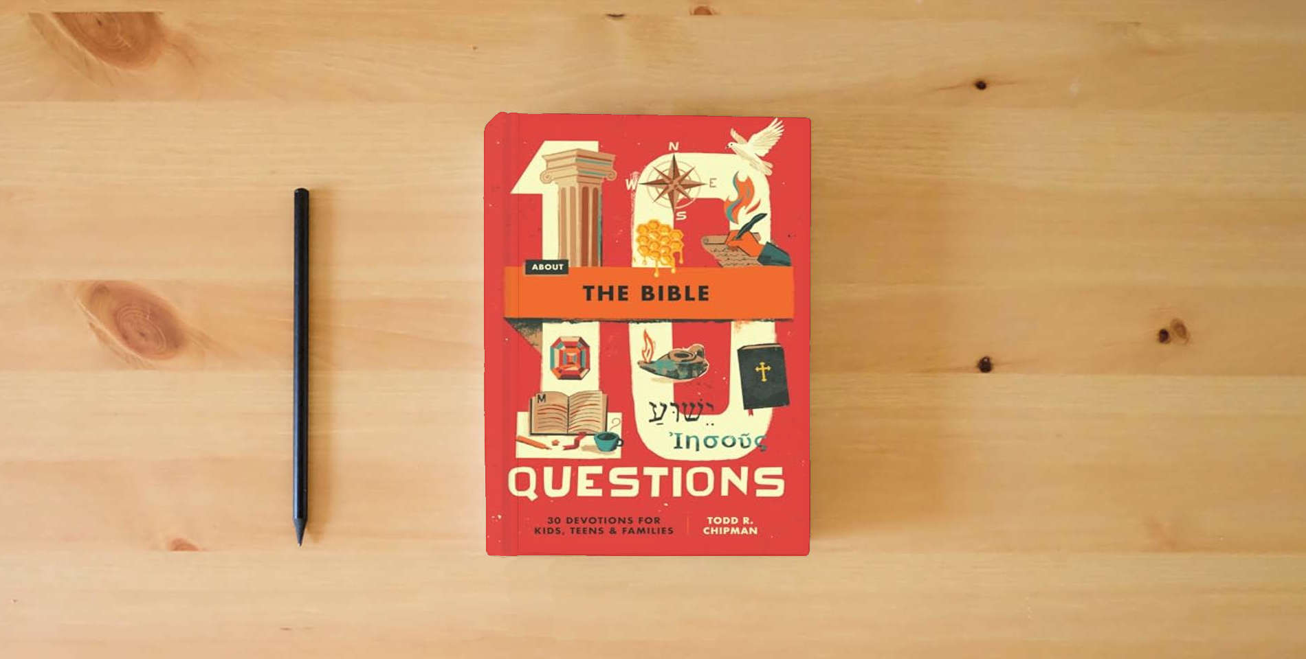 The book 10 Questions About the Bible: 30 Devotions for Kids, Teens, and Families is on the table