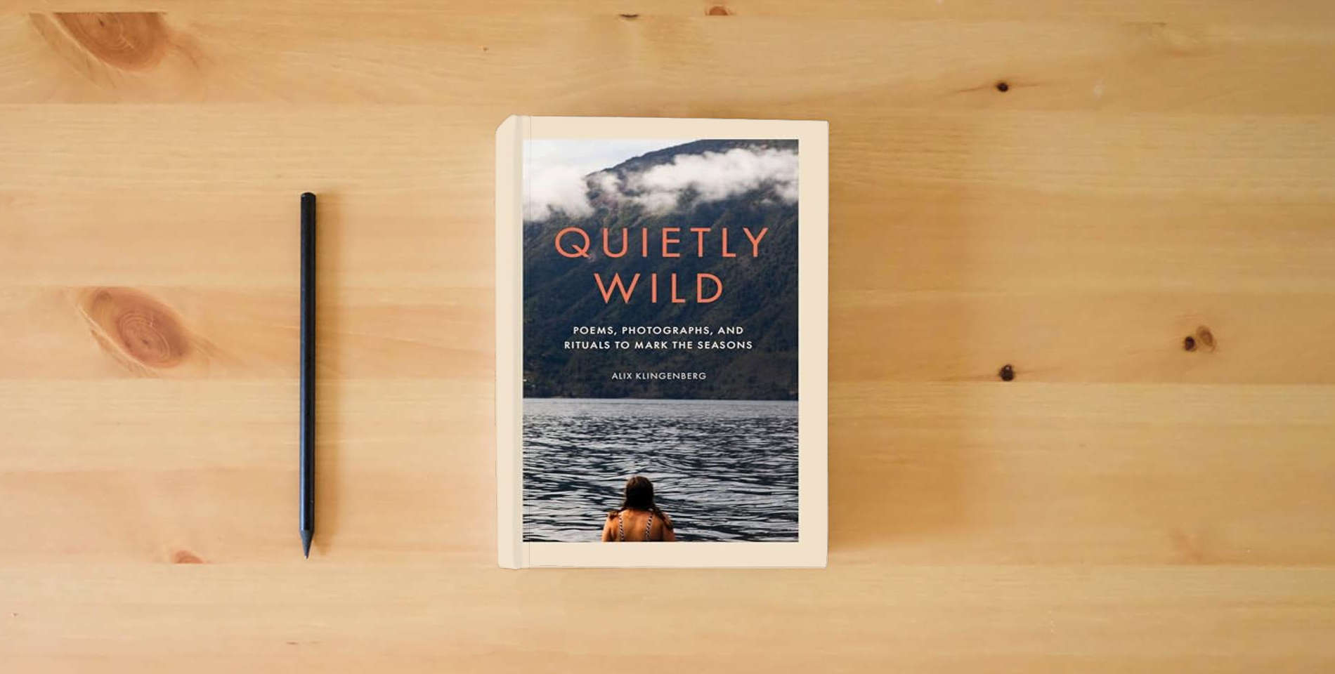 The book Quietly Wild: Poems, Photographs, and Rituals to Mark the Seasons is on the table