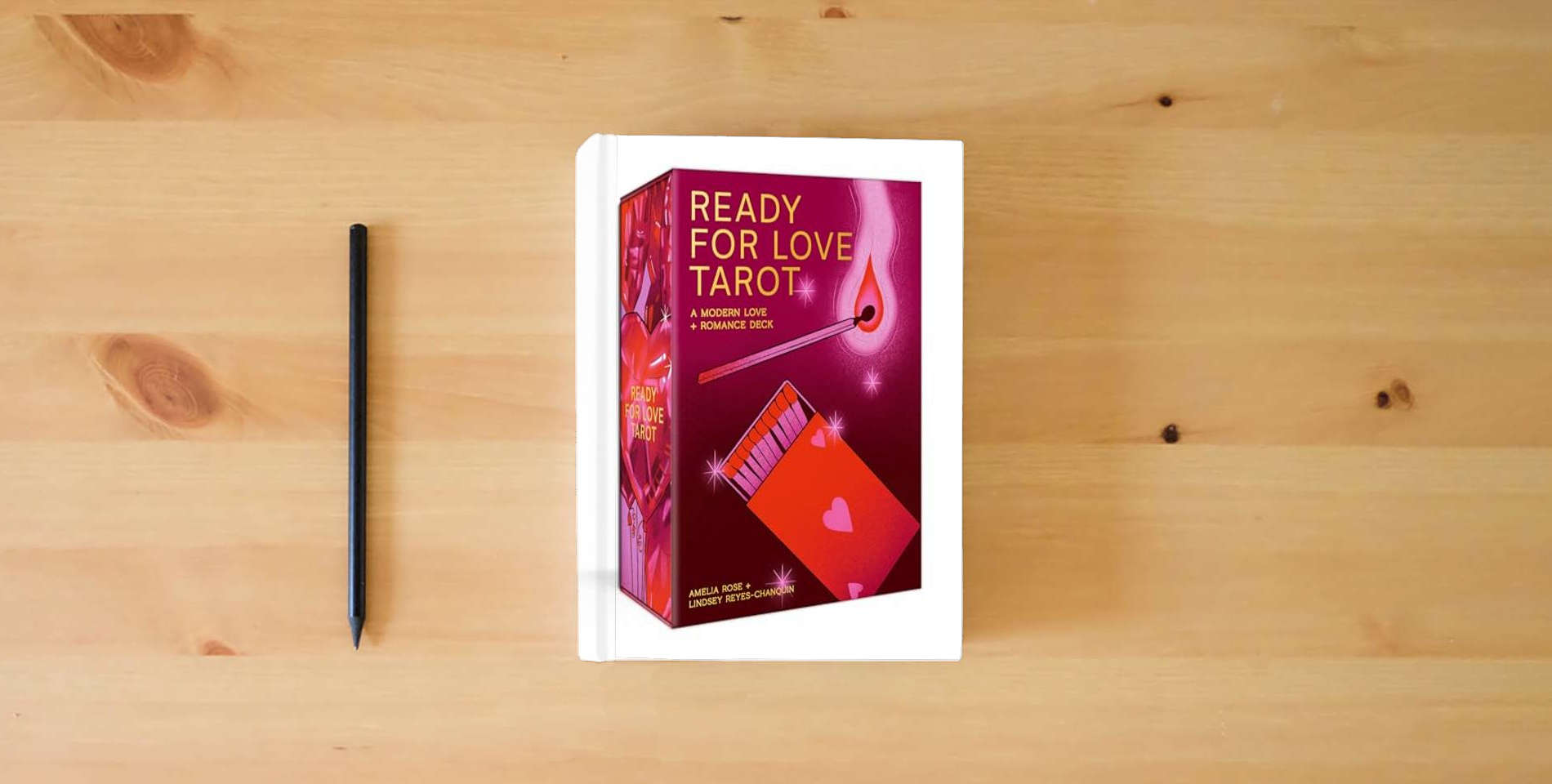 The book Ready for Love Tarot: A 78-Card Deck and Guidebook. A Modern Love and Romance Deck is on the table