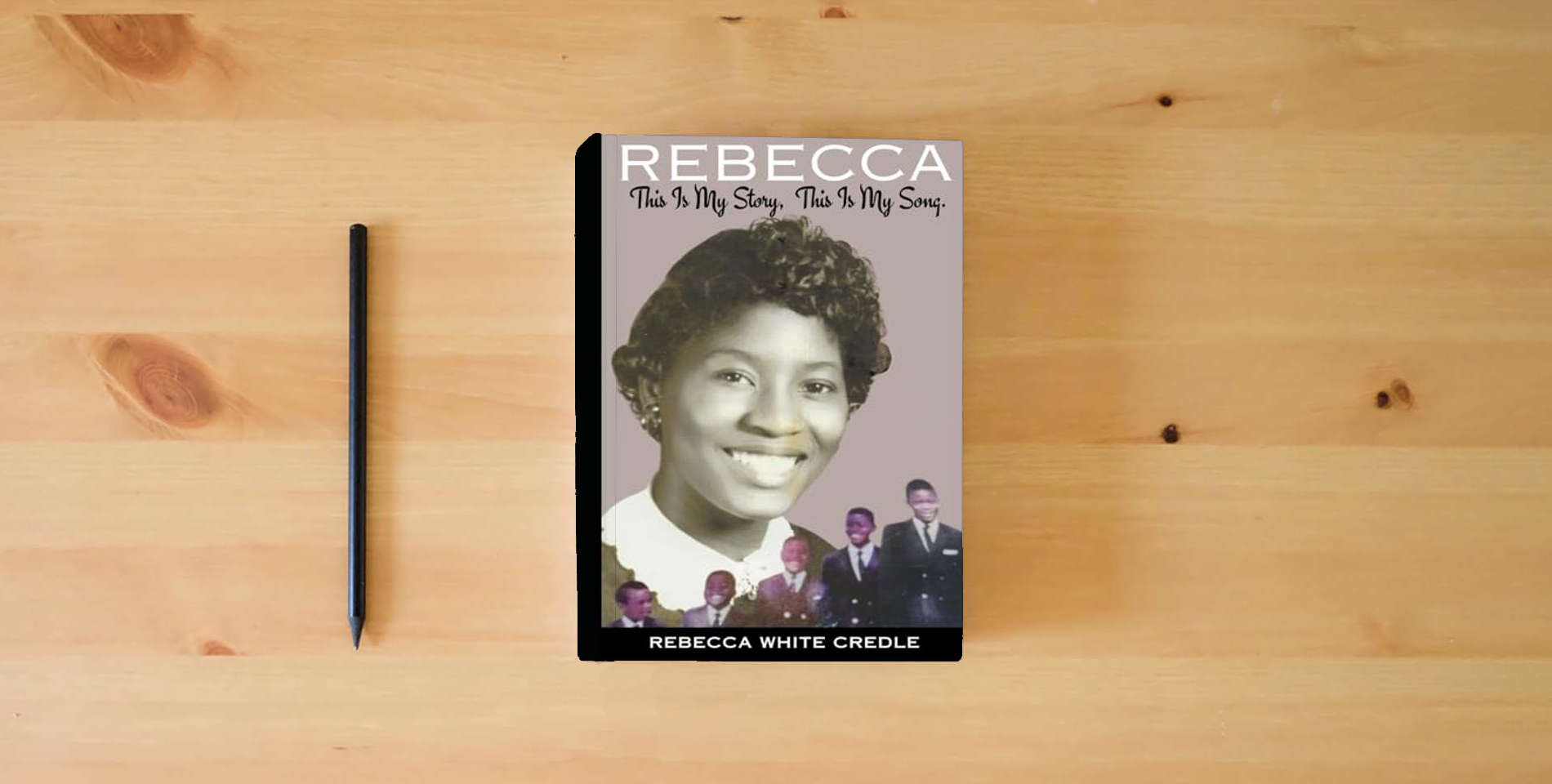 The book Rebecca: This Is My Story. This Is My Song. is on the table