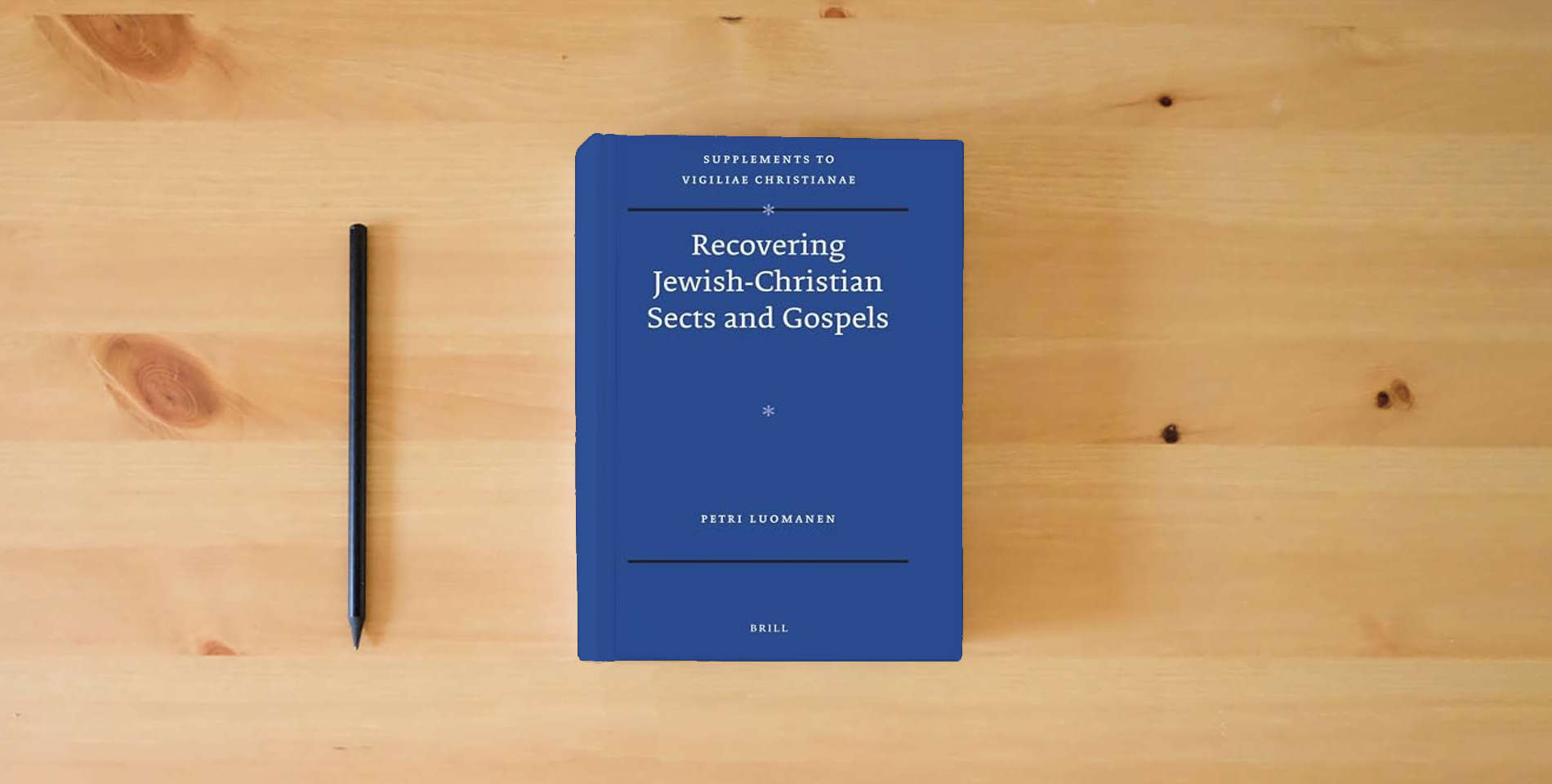 The book Recovering Jewish-Christian Sects and Gospels (Vigiliae Christianae, Supplements, 110) is on the table