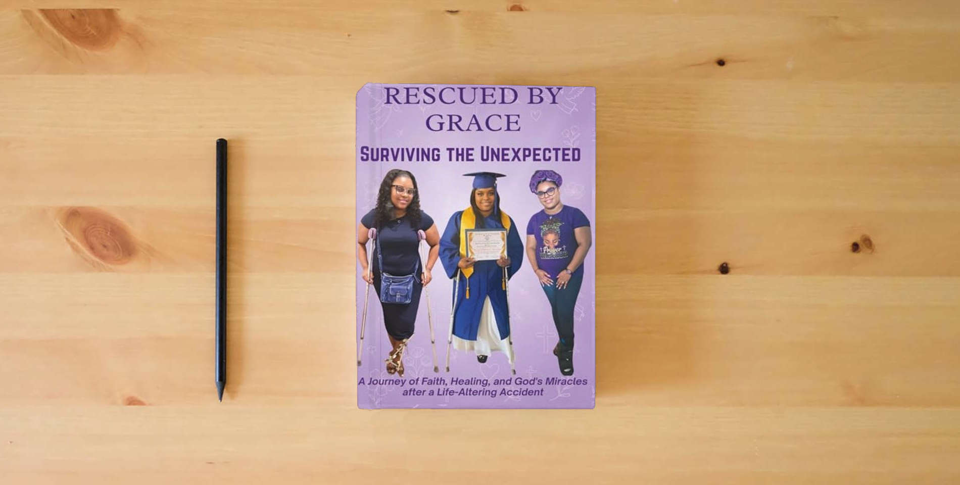 The book Rescued by Grace: A Journey of Faith, Healing, and God’s Miracles After a Life-Altering Accident is on the table