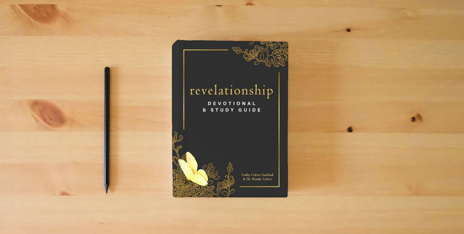 The book Revelationship Devotional & Study Guide is on the table