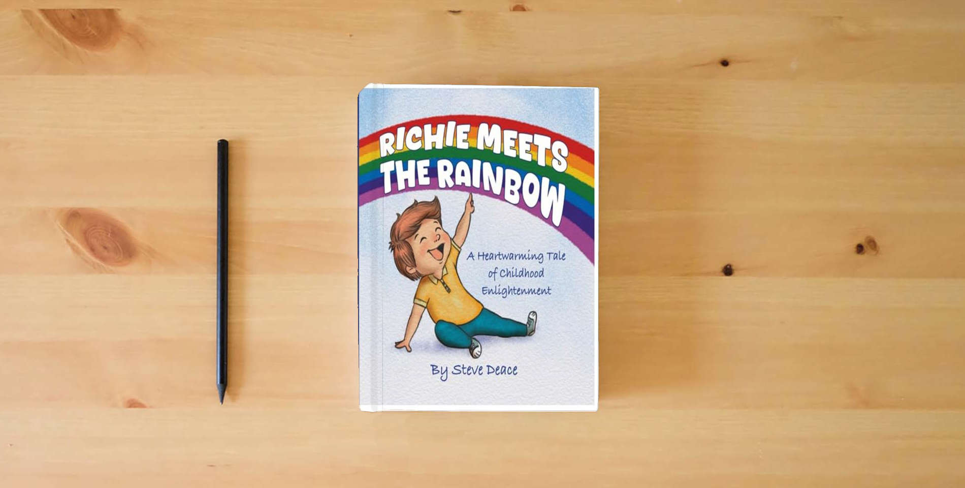 The book Richie Meets The Rainbow: A Heartwarming Tale of Childhood Enlightenment is on the table