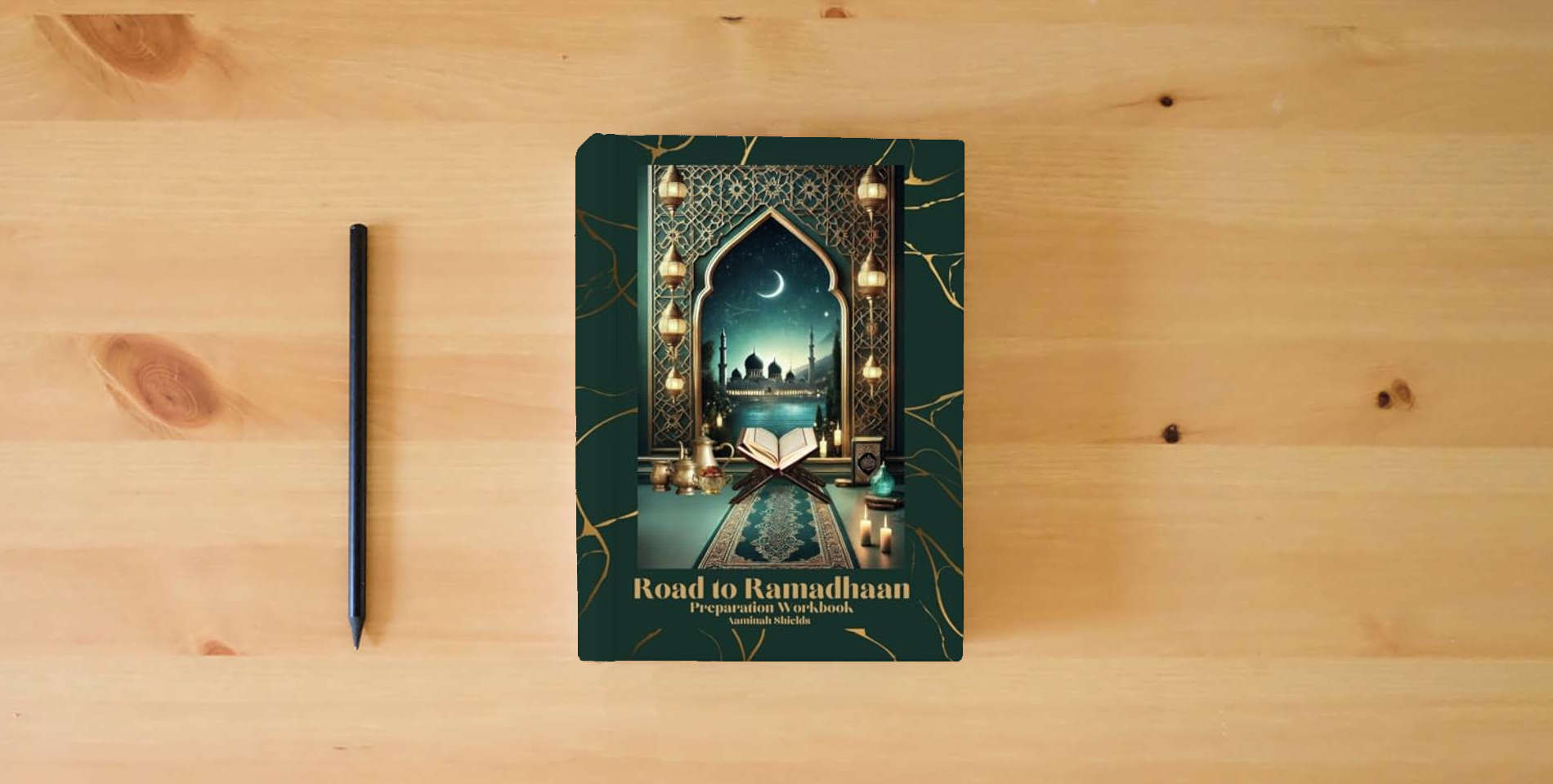 The book Road to Ramadhaan: Preparation Workbook is on the table