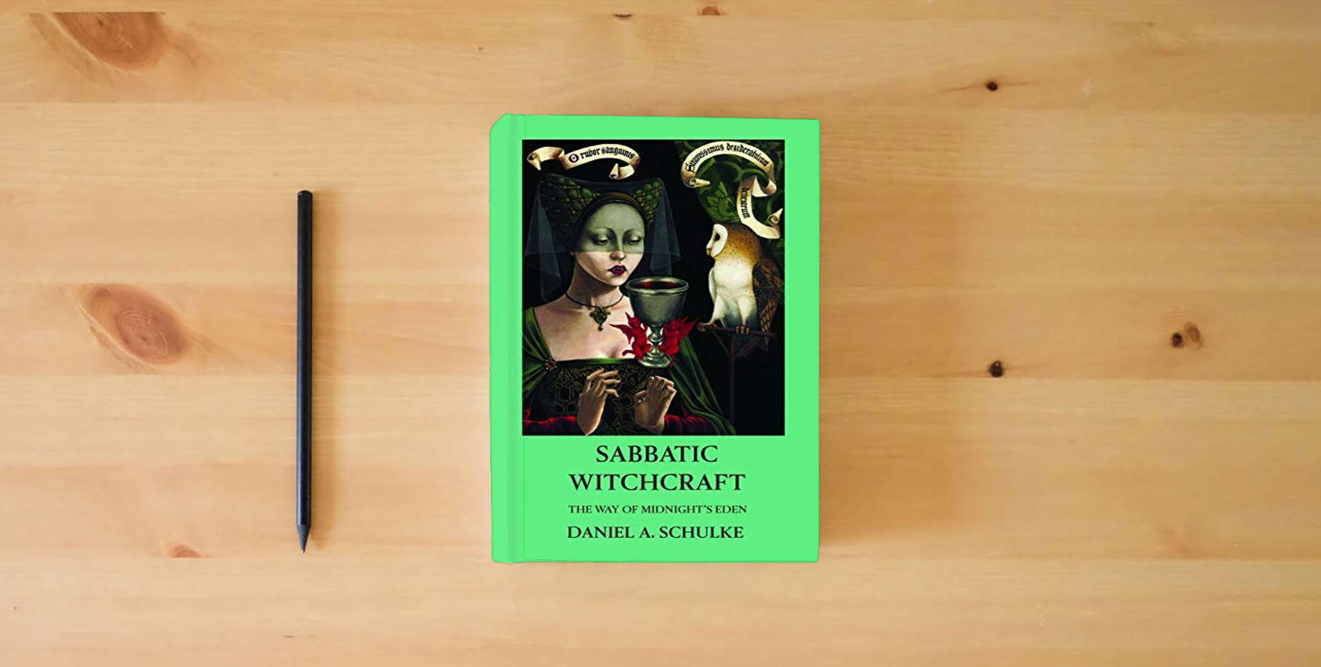 The book Sabbatic Witchcraft: The Way of Midnight's Eden is on the table