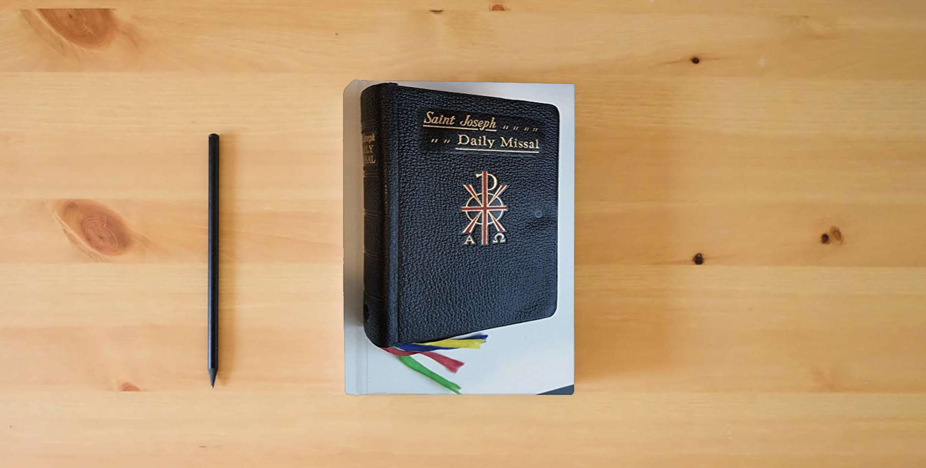 The book Saint Joseph Daily Missal: The Official Prayers of the Catholic Church - Completely Revised Edition is on the table