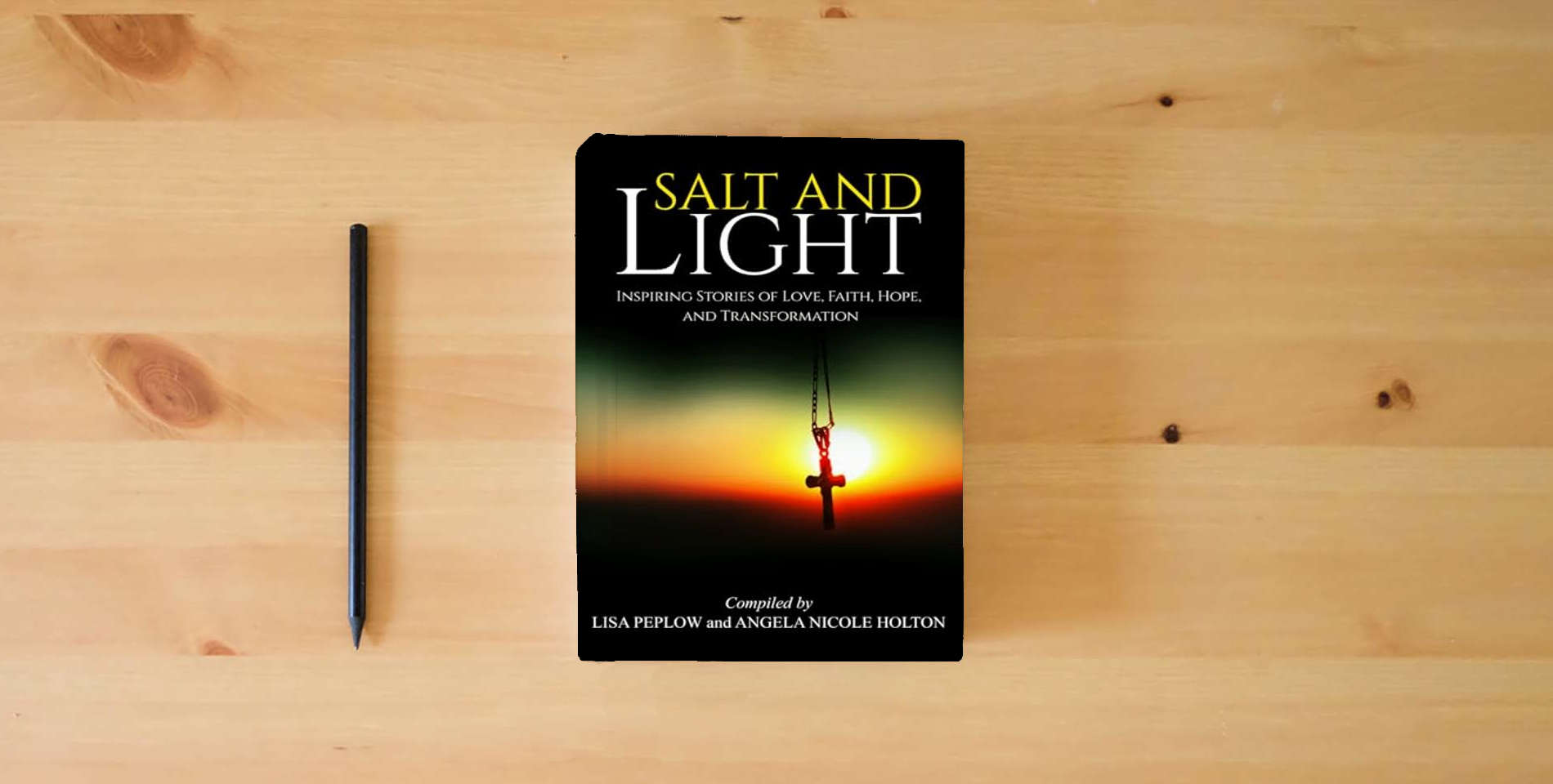 The book Salt and Light: Inspiring Stories of Love, Hope, Faith, and Transformation is on the table