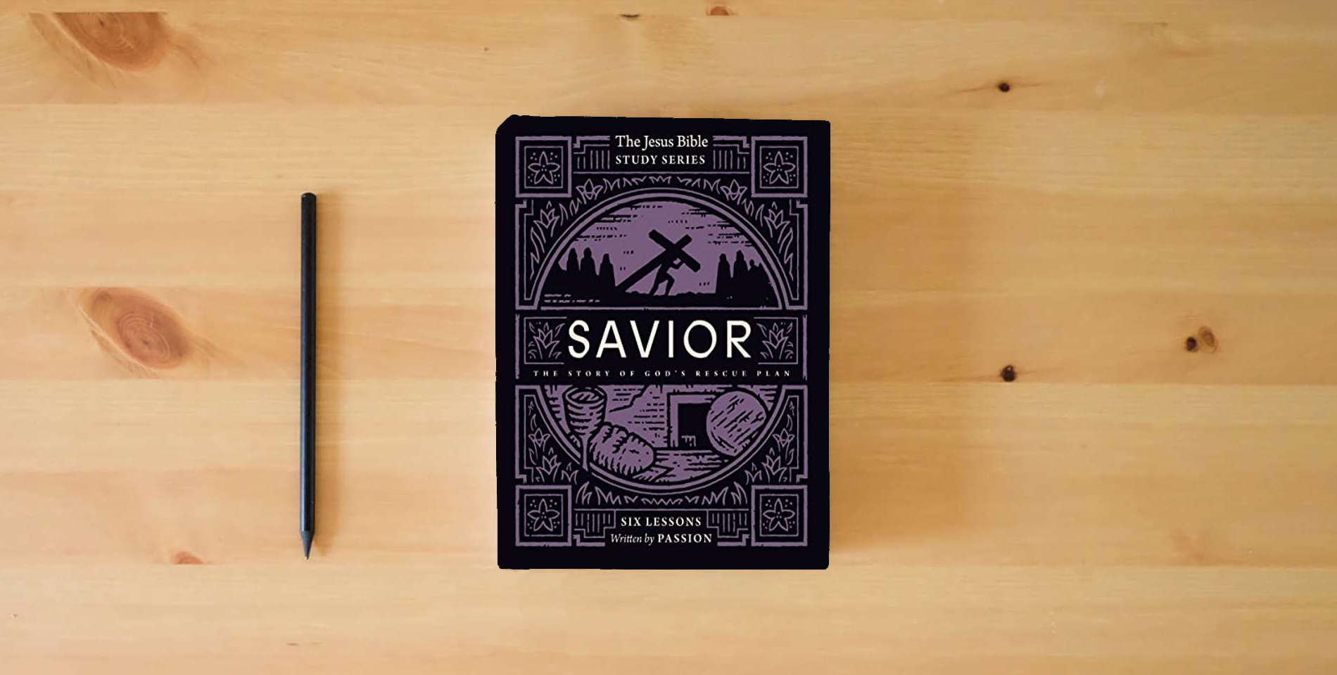 The book Savior Bible Study Guide: The Story of God’s Rescue Plan (Jesus Bible Study Series) is on the table
