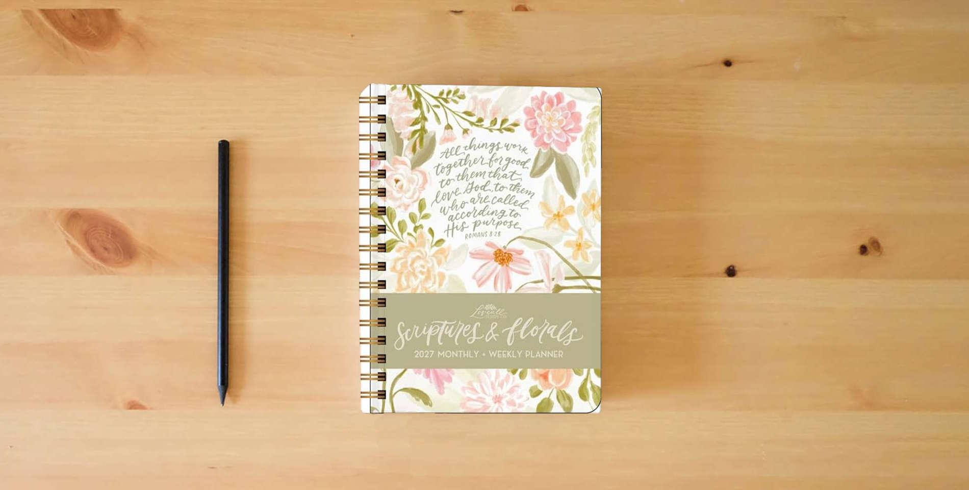 The book Scriptures and Florals 2027 Weekly/Monthly Planner Calendar is on the table