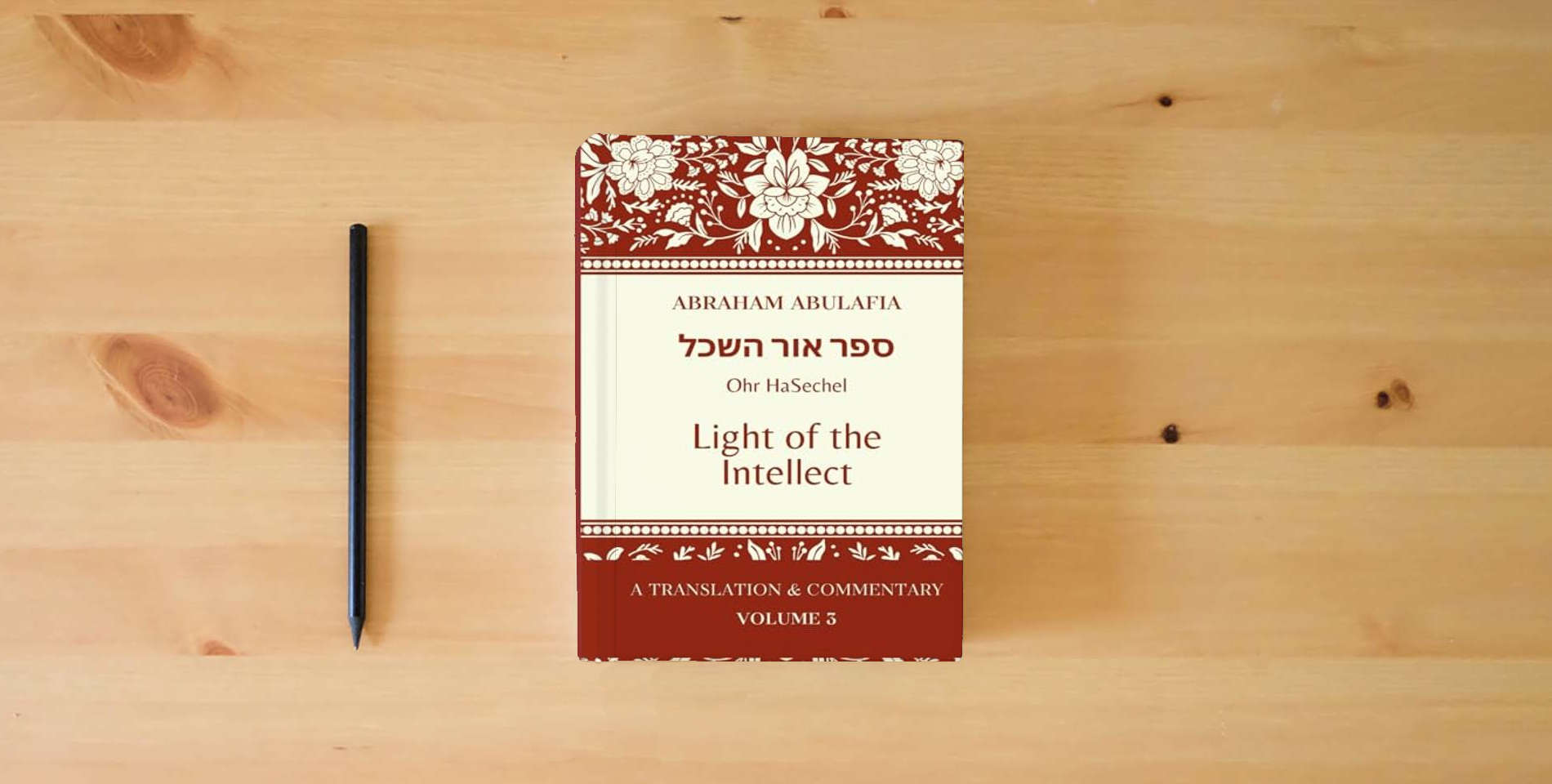 The book Sefer Ohr HaSechel: Light of the Intellect (The Language of Prophecy: The Collected Works of Abraham Abulafia) is on the table