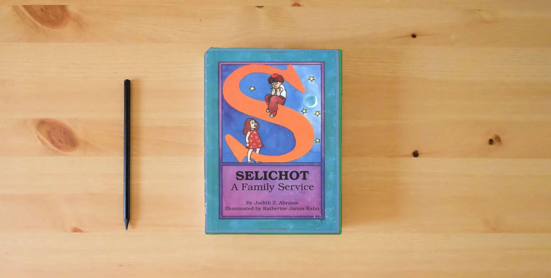 The book Selichot--A Family Service is on the table