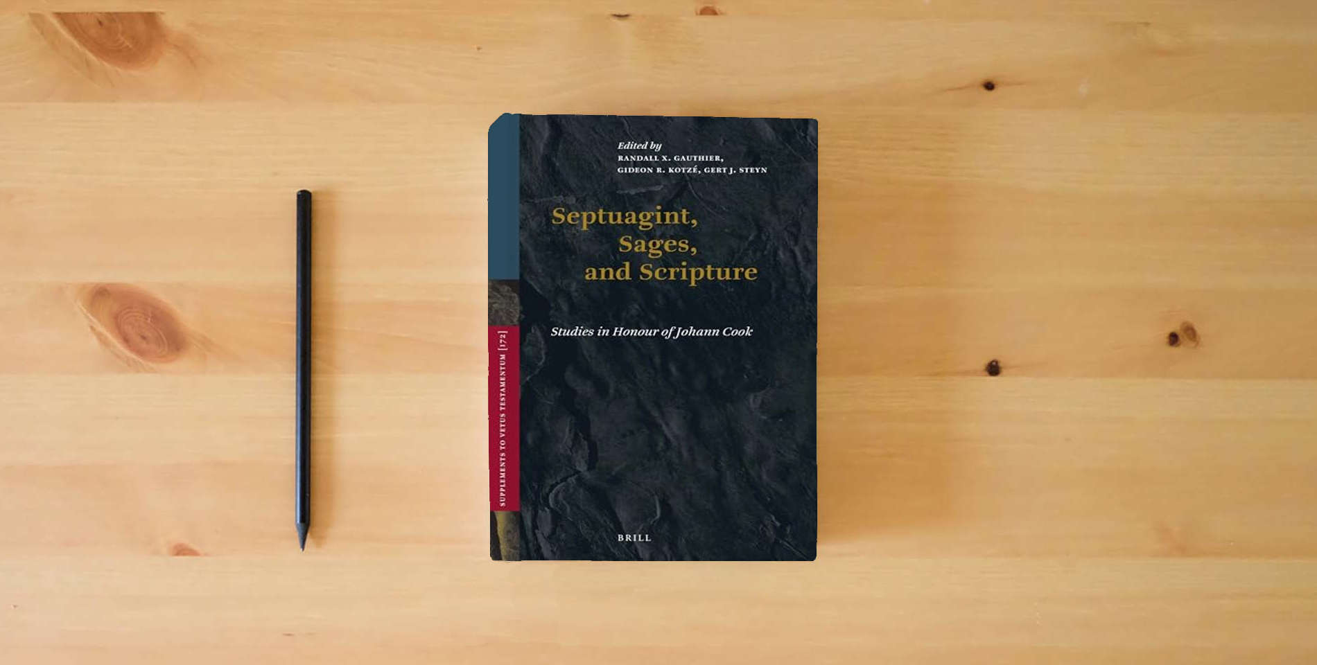 The book Septuagint, Sages, and Scripture: Studies in Honour of Johann Cook (Vetus Testamentum, Supplements, 172) is on the table