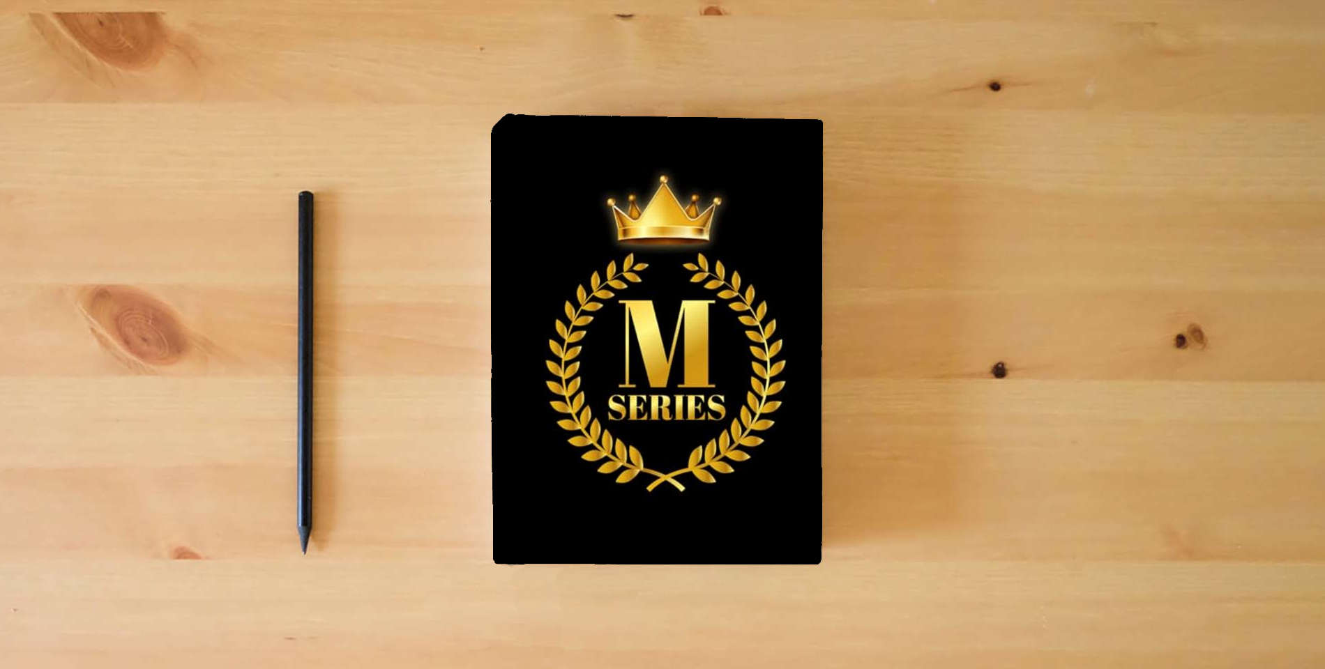 The book M Series Prayer Journal is on the table