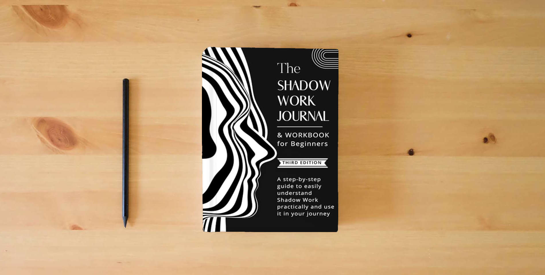 The book Shadow Work Journal & Workbook for Beginners: 3rd Edition. A step-by-step guide to easily understand Shadow Work practically and use it in your journey - Included Inner Child Prompts is on the table