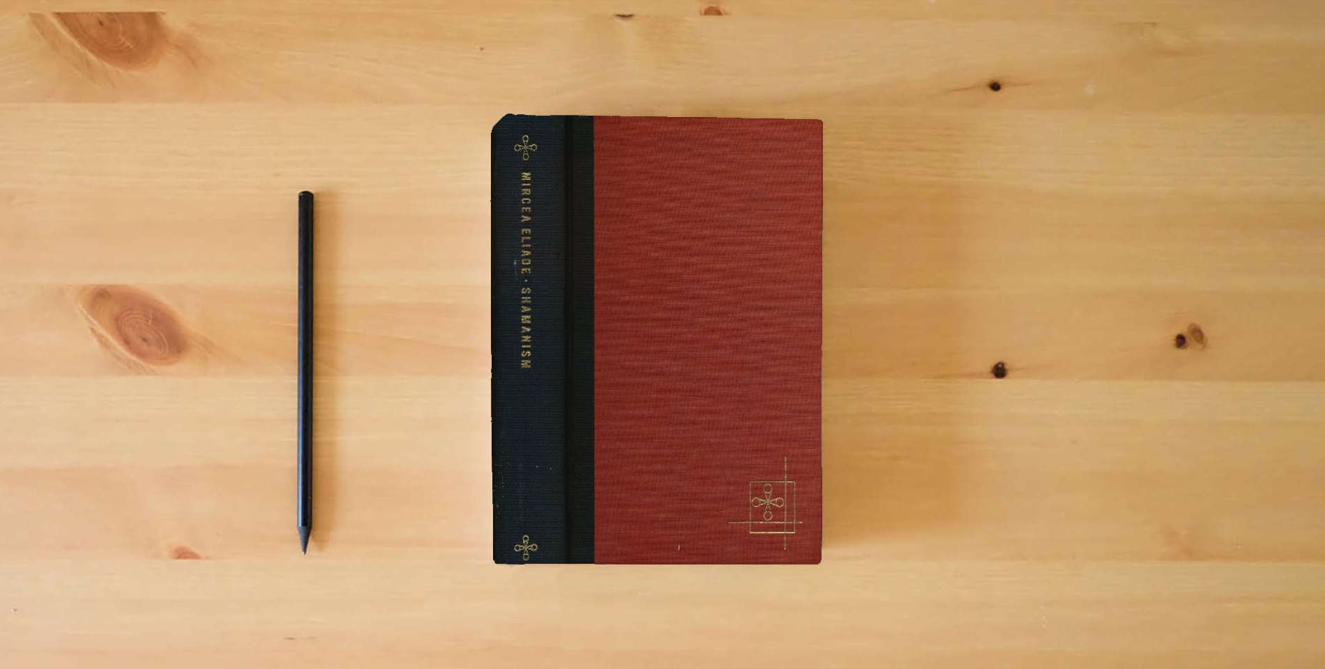 The book Shamanism: Archaic Techniques of Ecstasy - Bollingen Series LXXVI is on the table