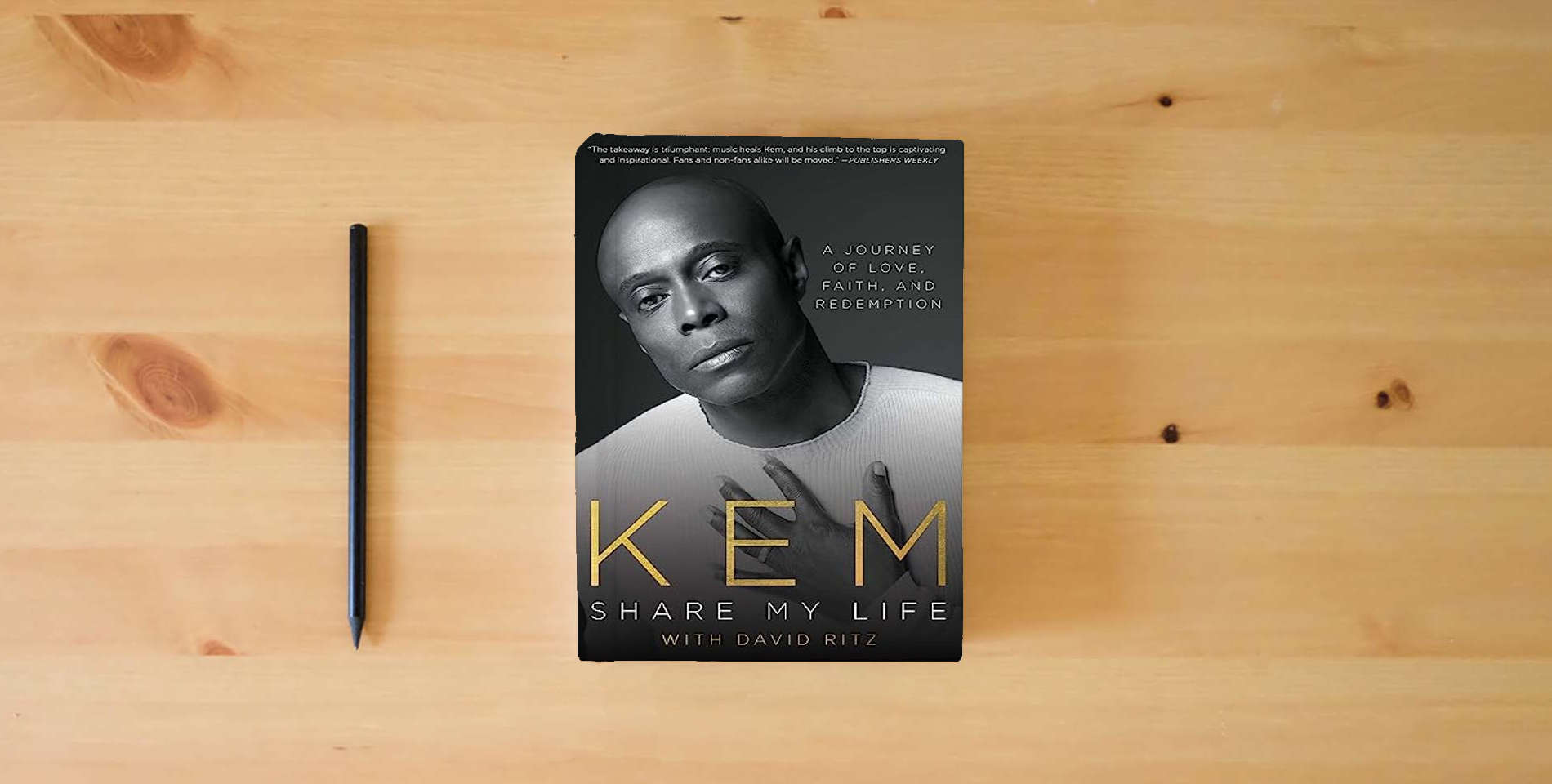 The book Share My Life: A Journey of Love, Faith and Redemption is on the table