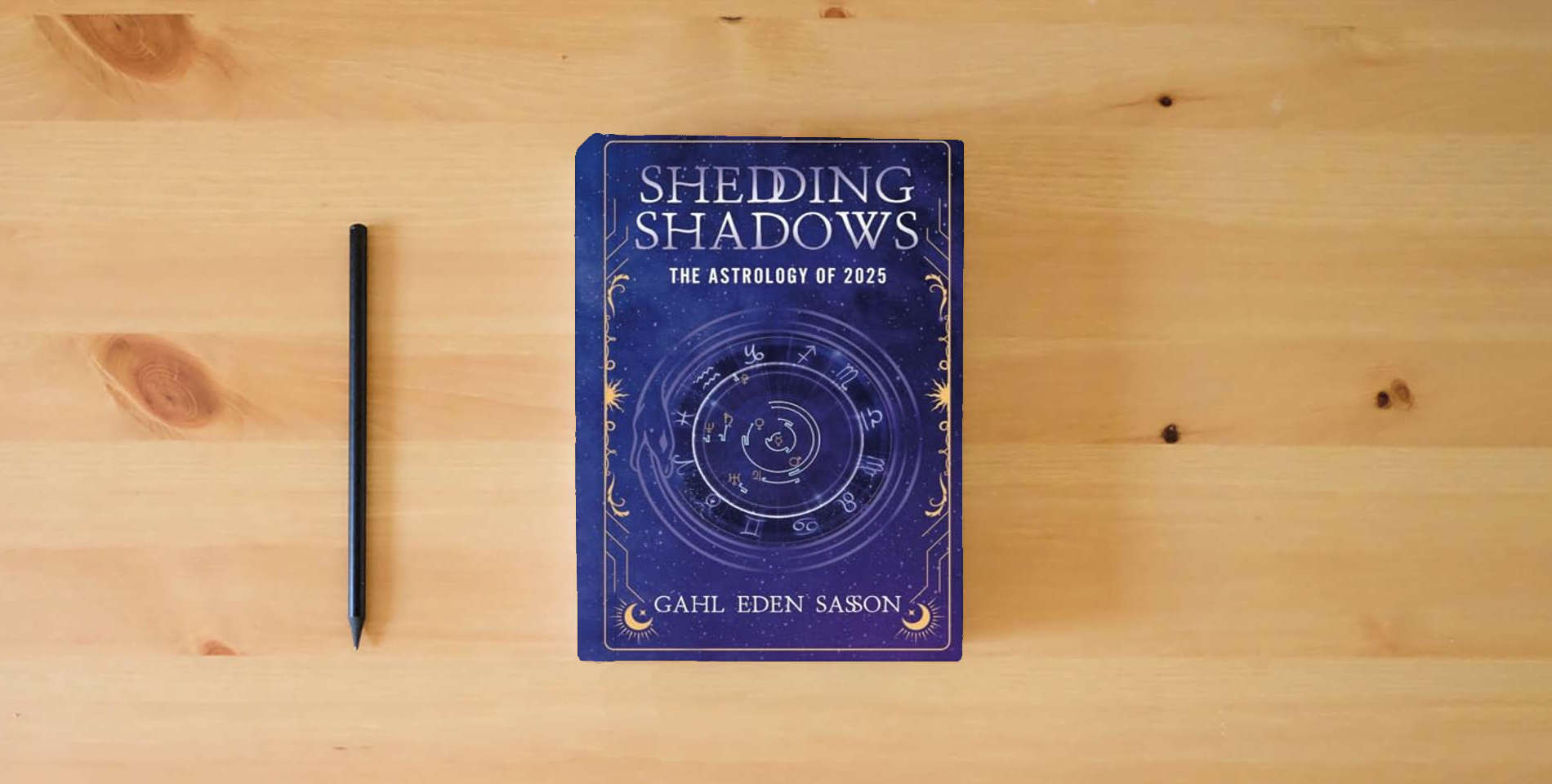 The book Shedding Shadows: The Astrology of 2025 - A Complete Planner Workbook and Guide to Astrological Predictions , Moon Phase and Magic Calendar , Kabbalah , Numerology , and Horoscope Insight is on the table