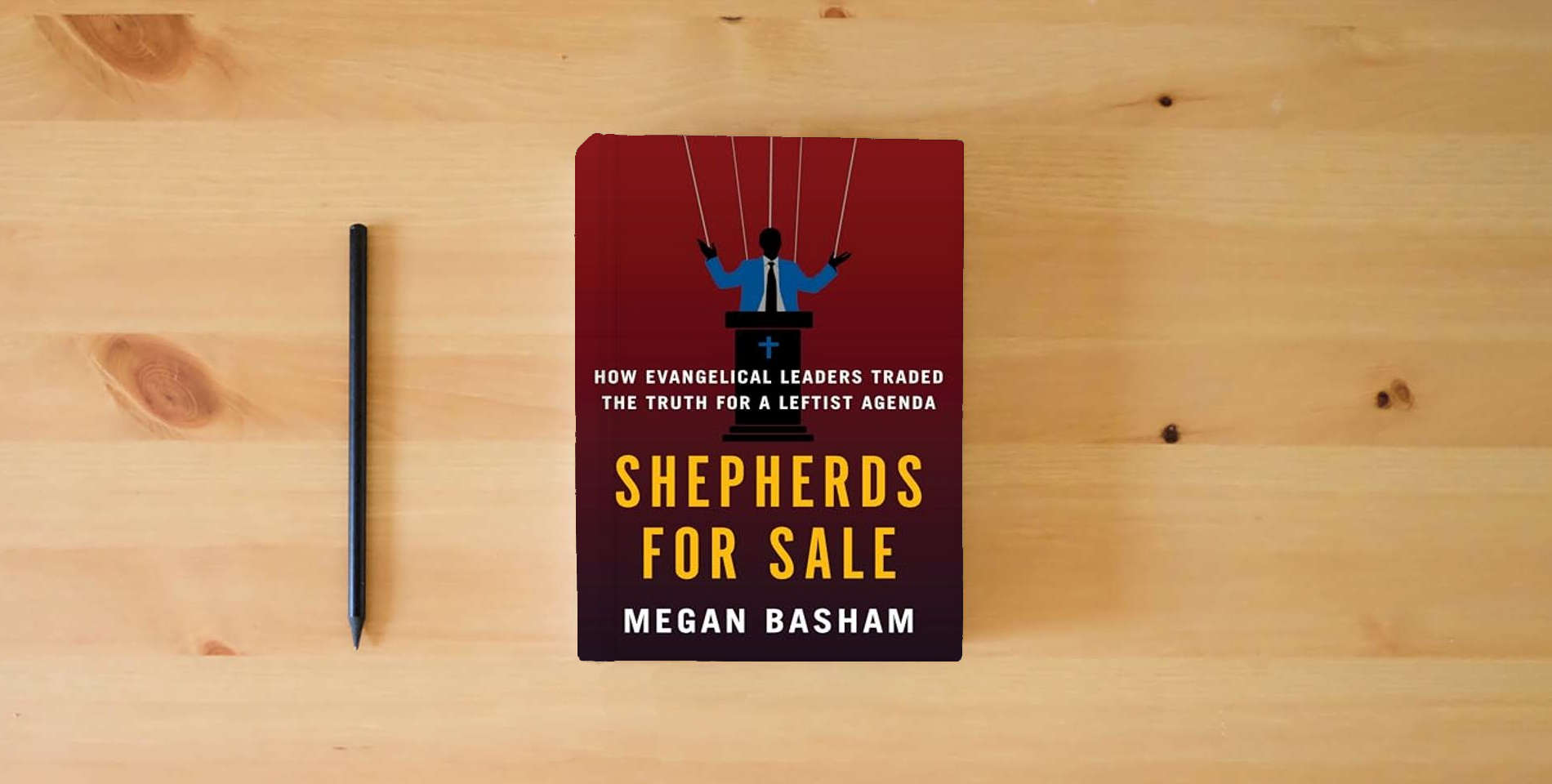 The book Shepherds for Sale: How Evangelical Leaders Traded the Truth for a Leftist Agenda is on the table
