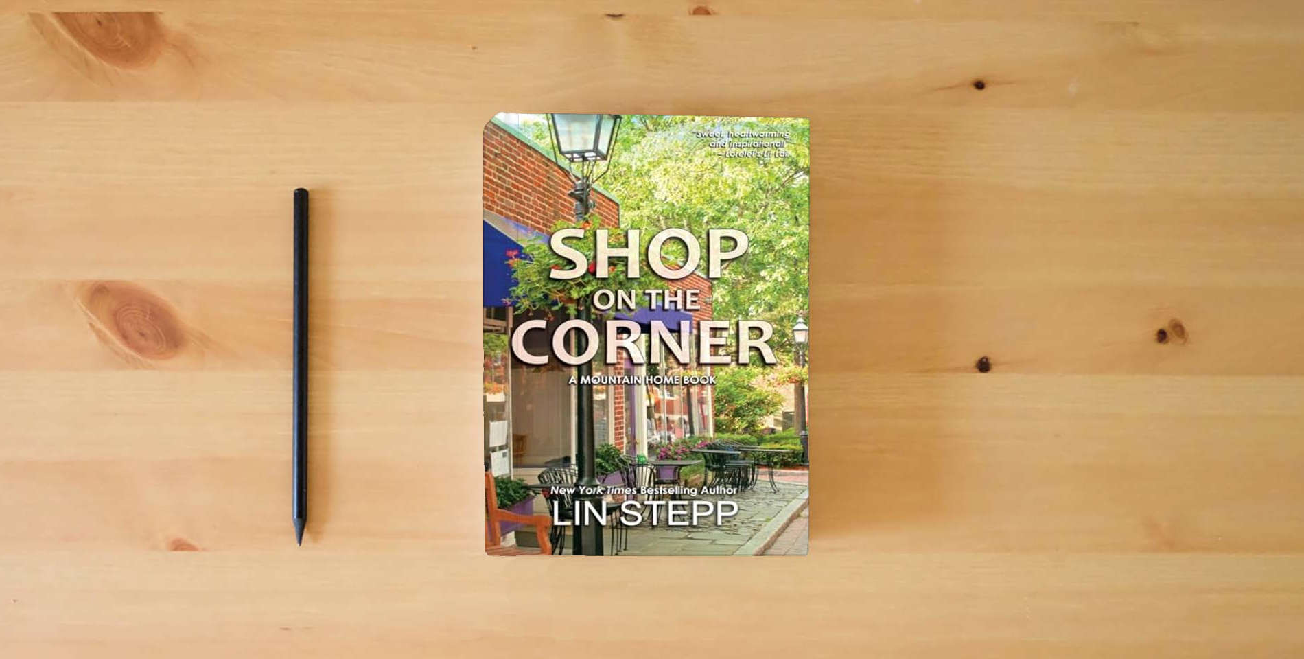 The book Shop On The Corner is on the table