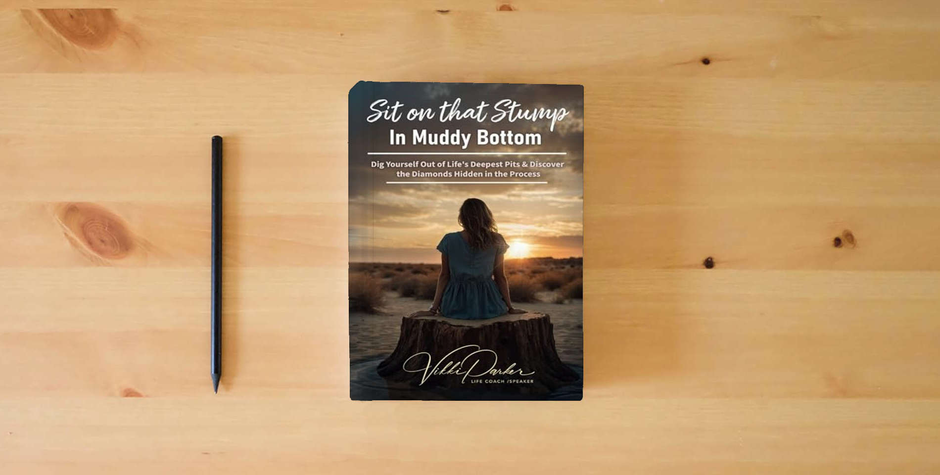 The book Sit on that Stump In Muddy Bottom: Dig Yourself Out of Life's Deepest Pits & Discover the Diamonds Hidden in the Process is on the table