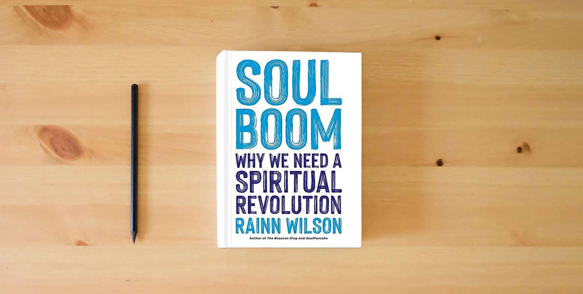 The book Soul Boom: Why We Need a Spiritual Revolution is on the table
