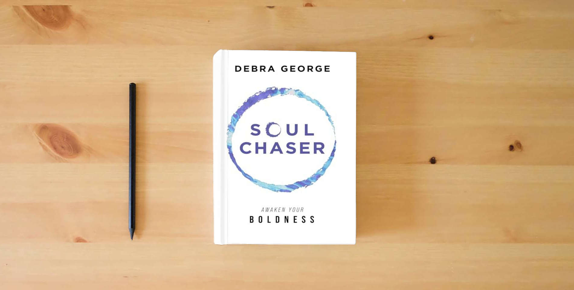 The book Soul Chaser: Awaken Your Boldness is on the table