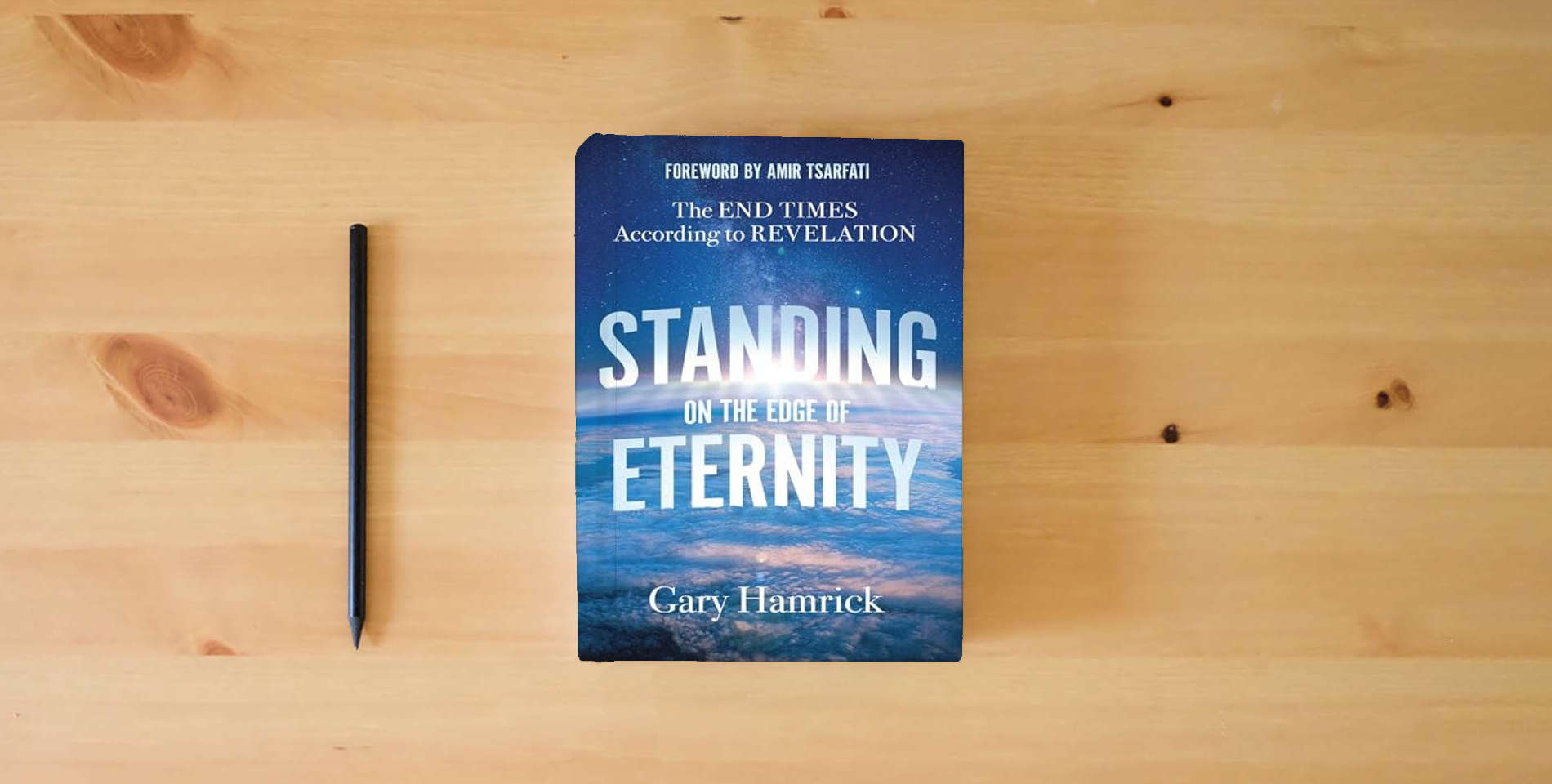 The book Standing on the Edge of Eternity: The End Times According to Revelation is on the table