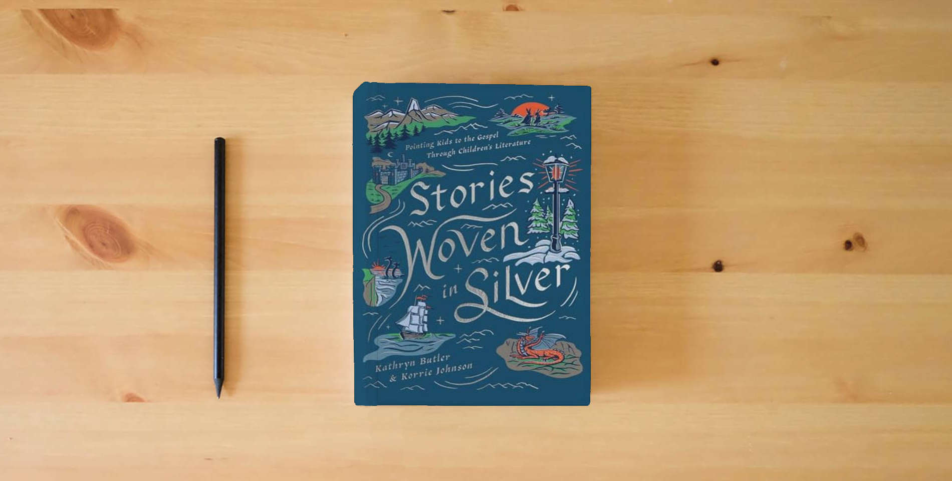 The book Stories Woven in Silver: Pointing Kids to the Gospel Through Children's Literature is on the table