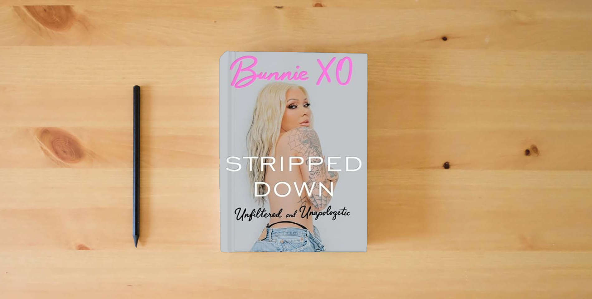 The book Stripped Down: Unfiltered and Unapologetic – A Modern-Day Memoir from the Trailer Parks of Vegas to Nashville and Podcast Stardom is on the table