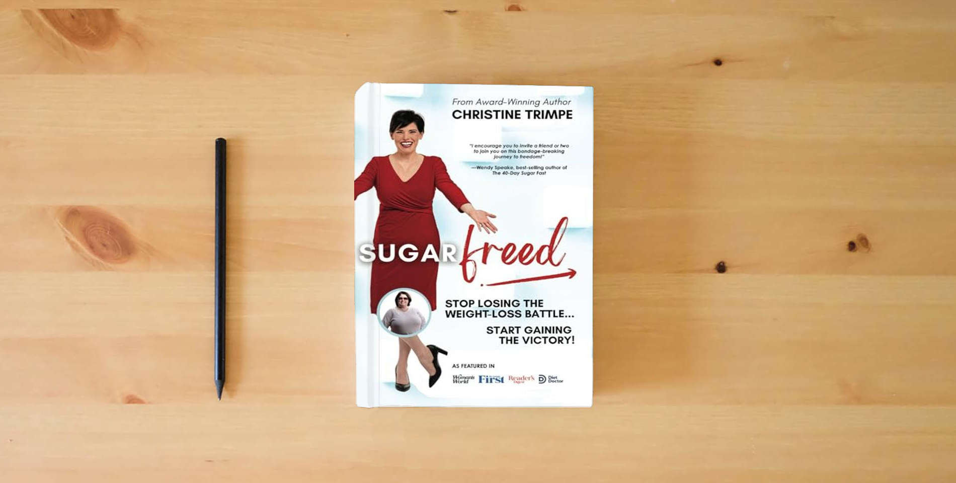 The book SugarFreed: Stop Losing the Weight Loss Battle, Start Gaining the Victory is on the table