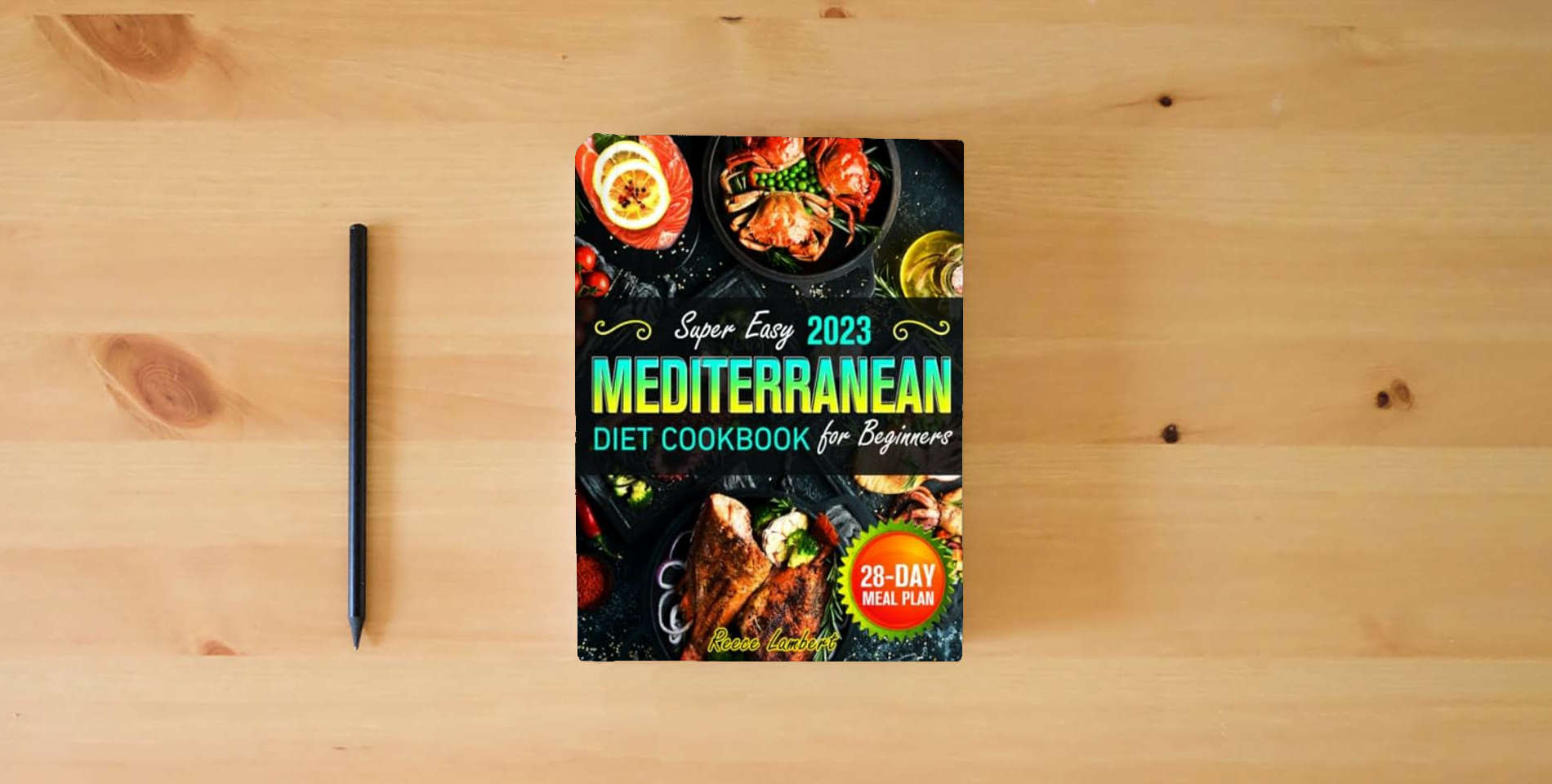 The book Super Easy Mediterranean Diet Cookbook for Beginners 2023: Simple and Nutritious Mediterranean Recipes to Kickstart a Healthy Eating Journey with a 28-Day Meal Plan to Transform Your Eating Habits is on the table