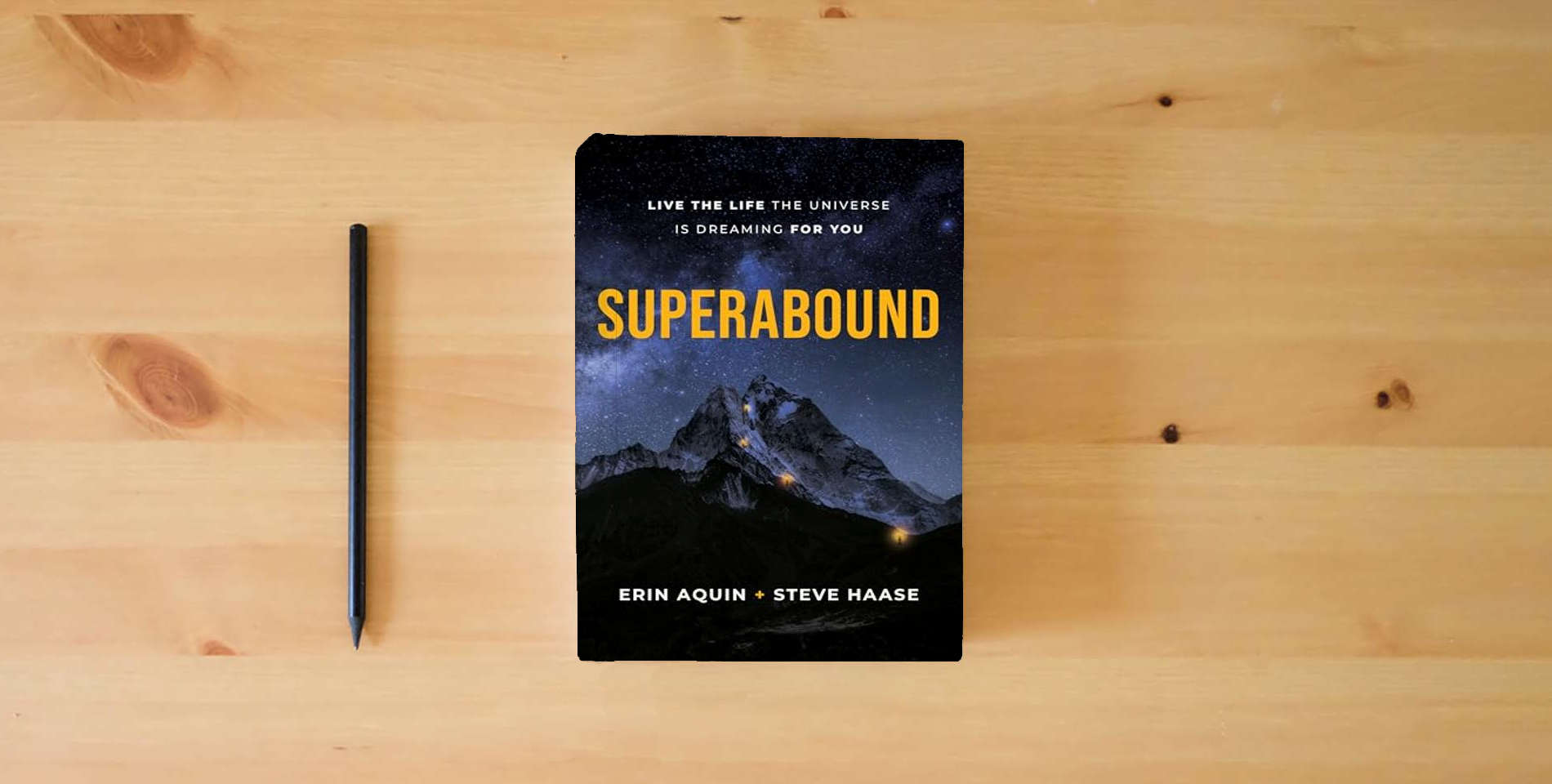 The book Superabound: Live the Life the Universe is Dreaming for You is on the table