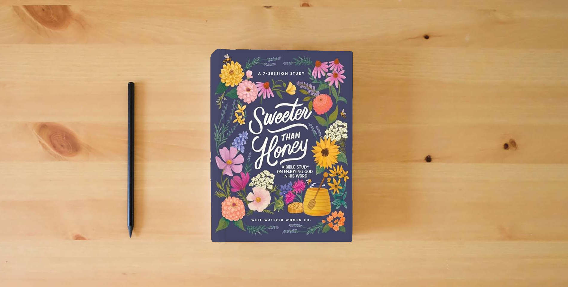 The book Sweeter than Honey: A Bible Study on Enjoying God in His Word is on the table