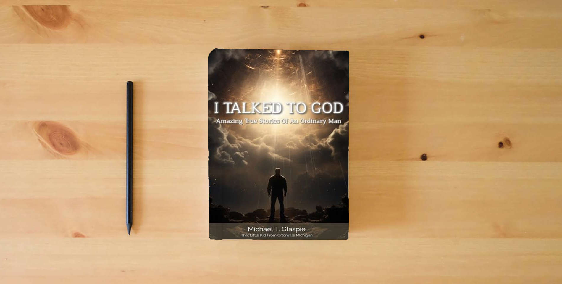 The book I Talked To God: Amazing True Stories Of An Ordinary Man is on the table