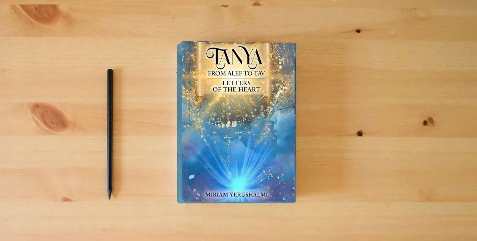 The book TANYA: FROM ALEF TO TAV LETTERS OF THE HEART is on the table